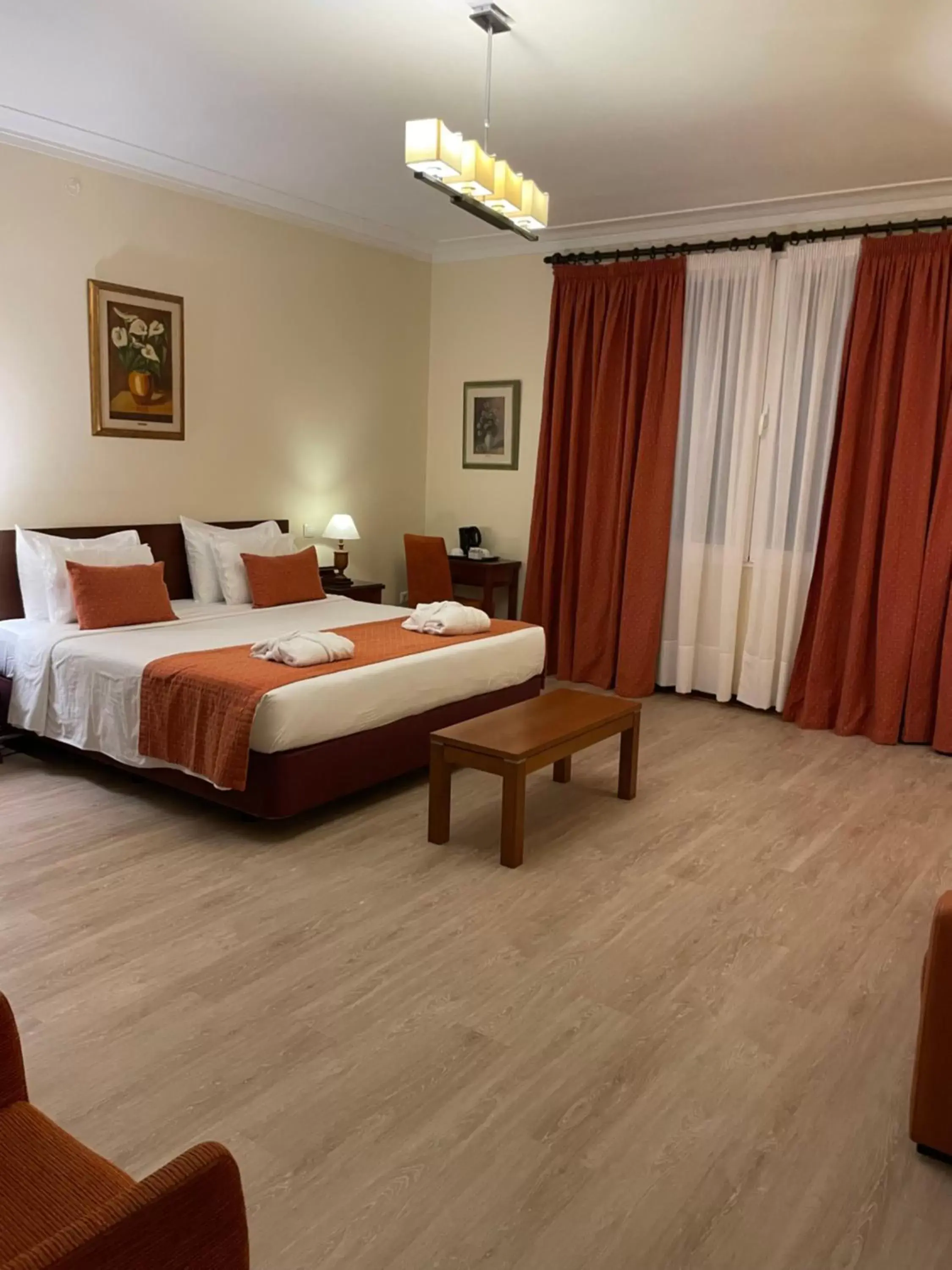 Bed in Pao de Acucar Hotel