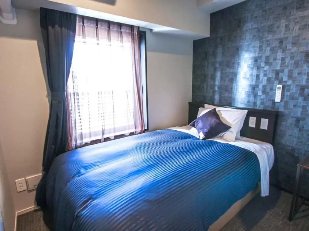 Bed in HOTEL LiVEMAX Osaka Honmachi Bed in HOTEL LiVEMAX Osaka Honmachi