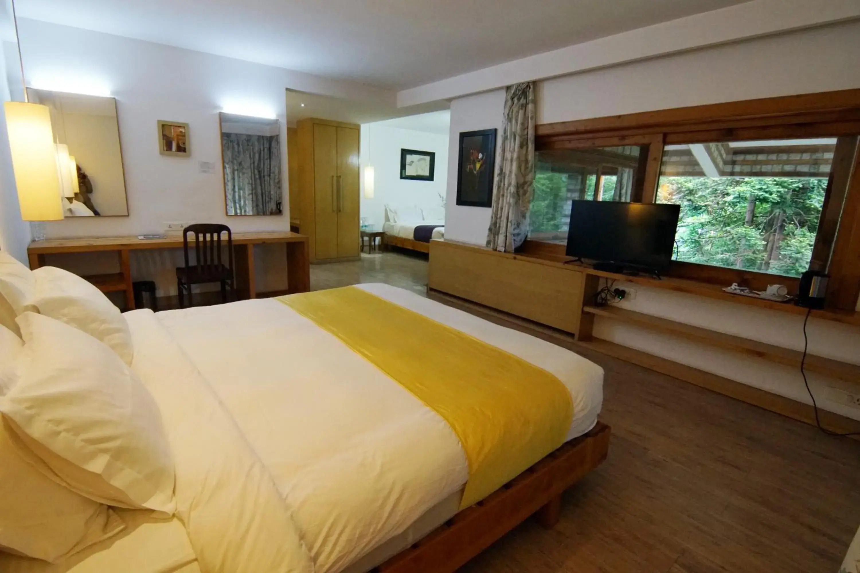 Bed, TV/Entertainment Center in Banon Resorts