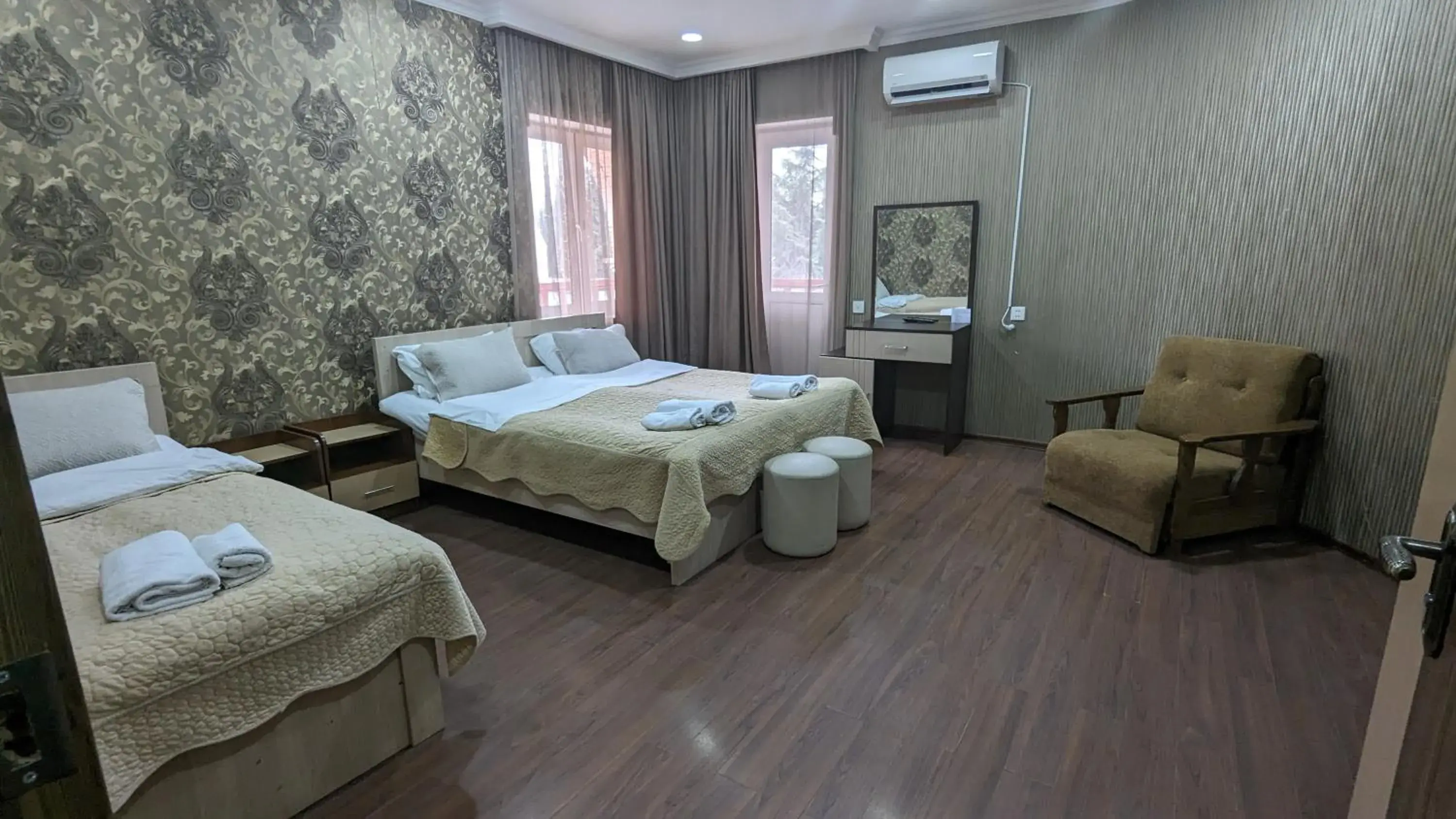 Bedroom in Dkd-bridge Hotel