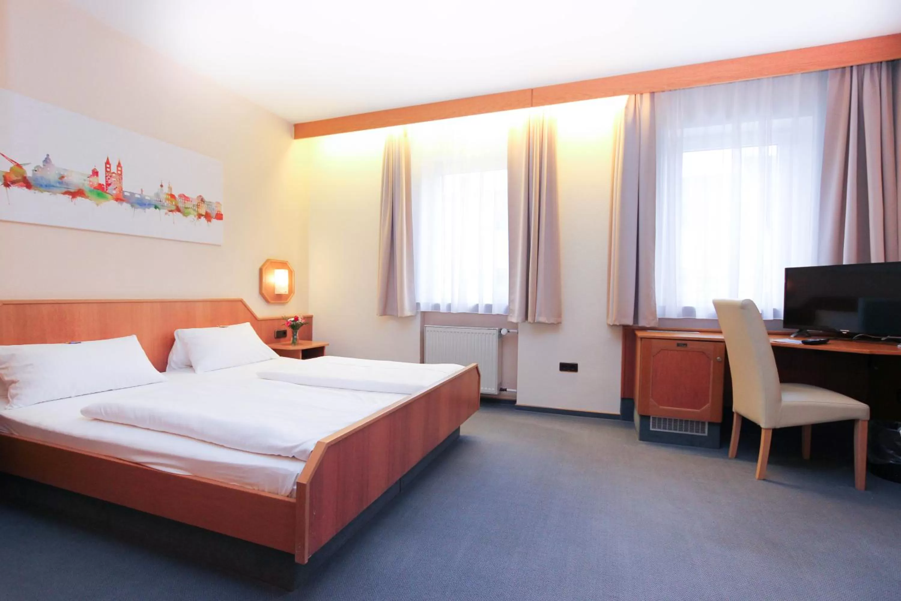 Bed in City Hotel Würzburg