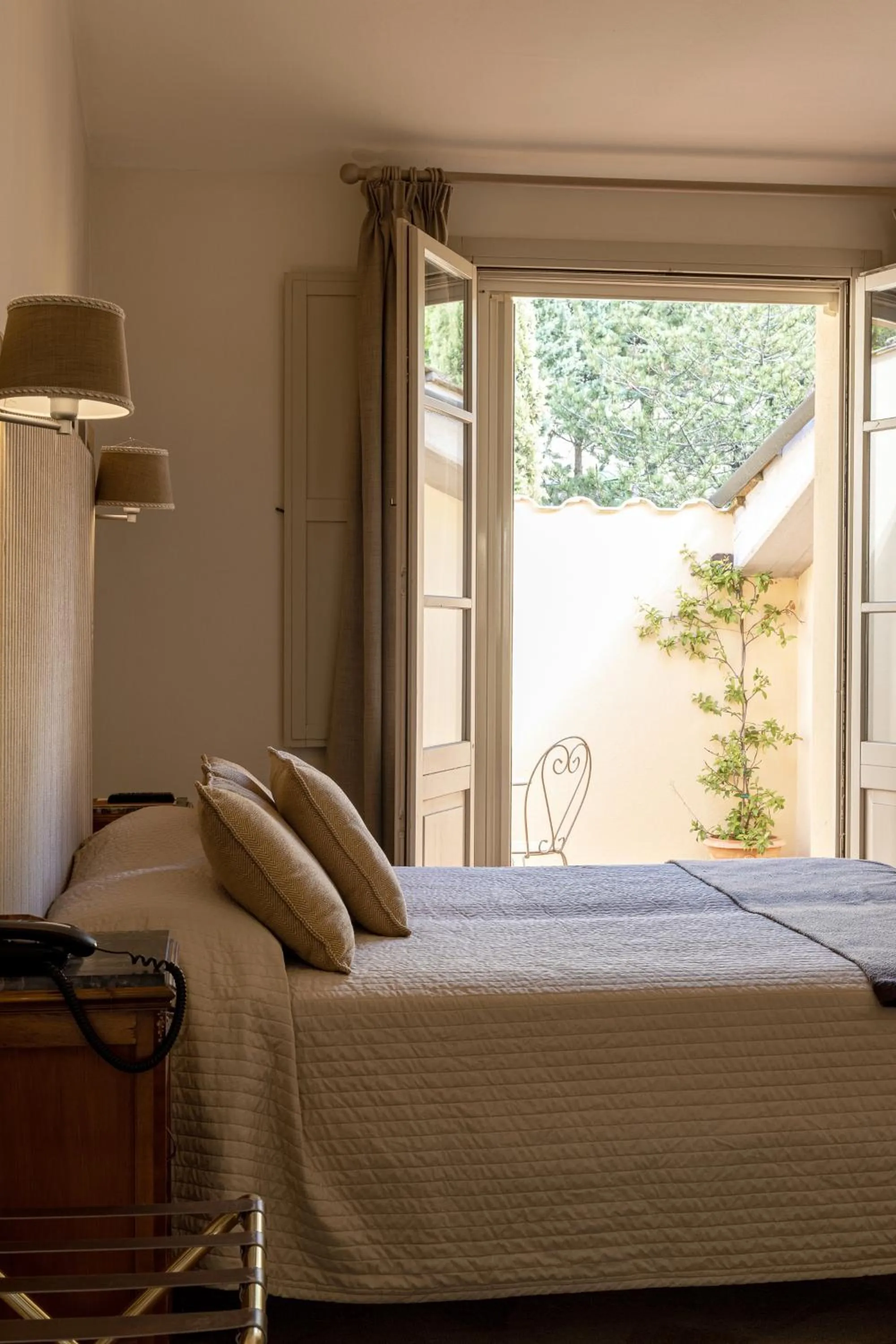 Bed in Si Montalcino Hotel