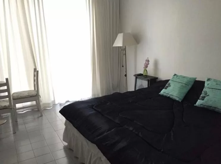 Bed in Oriental Smile Hotel