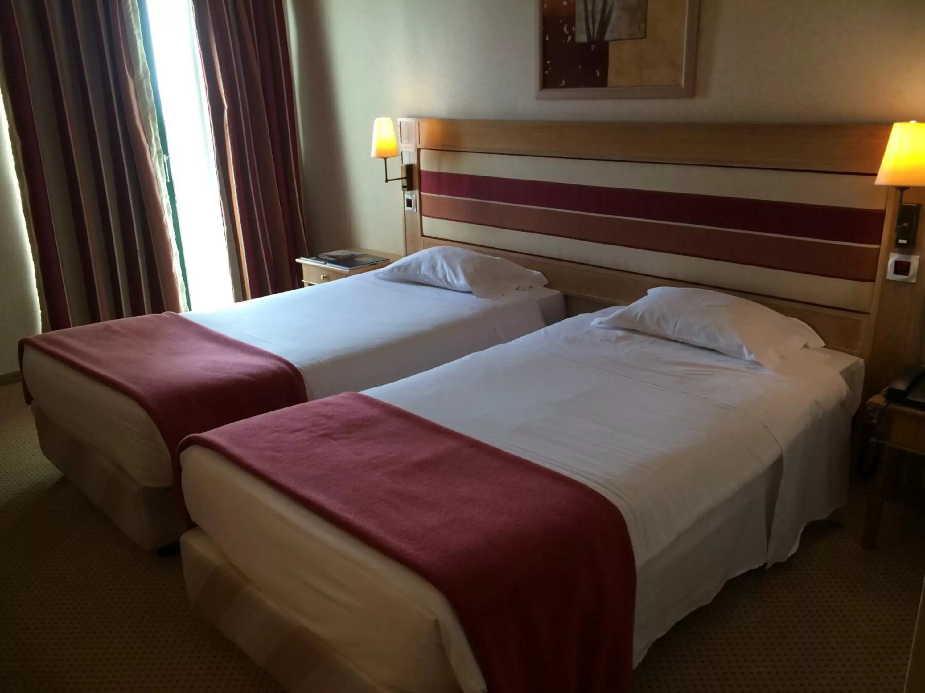 Bed in Riviera Hotel
