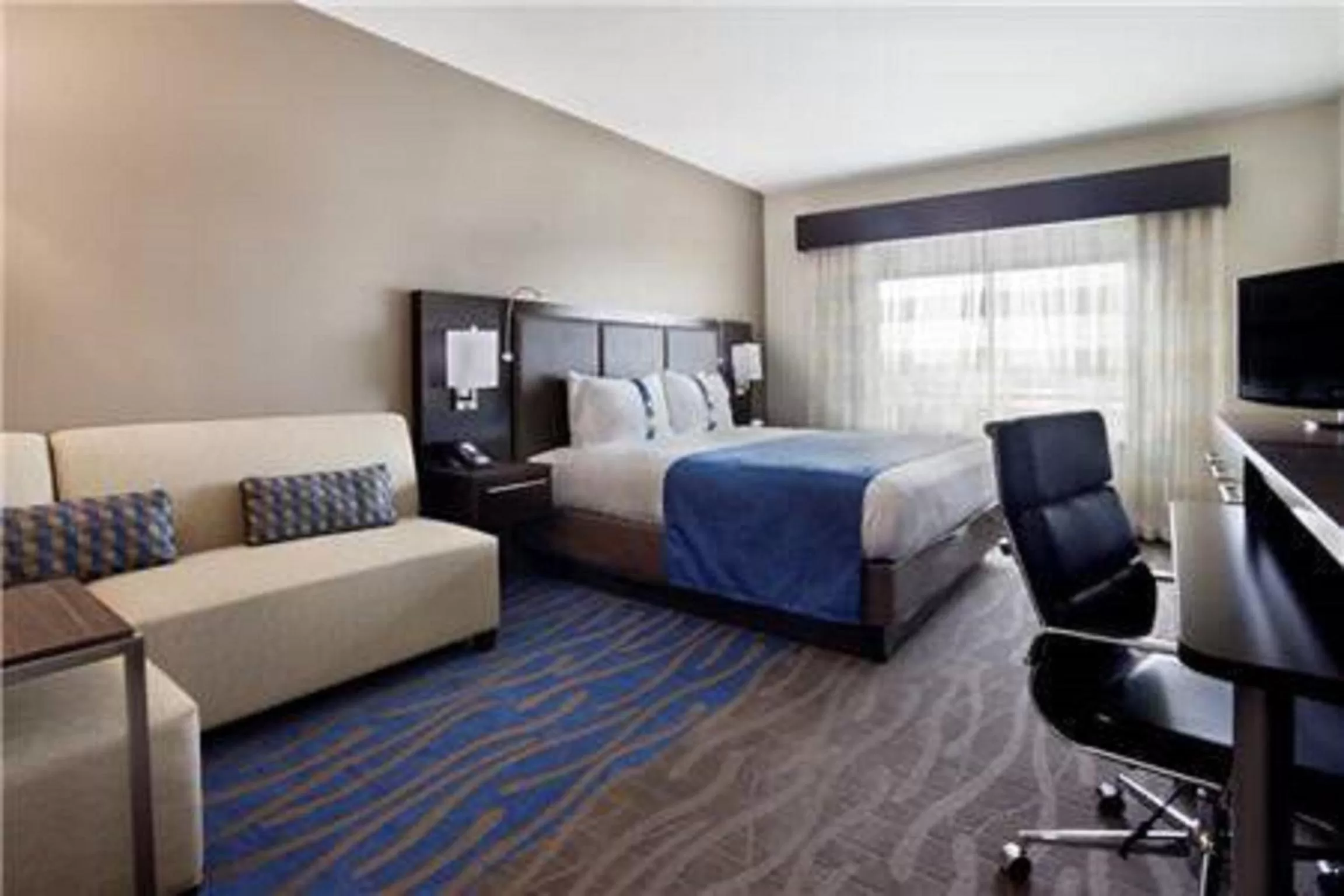 Bedroom, Bed in Holiday Inn Hotel & Suites Northwest San Antonio by IHG