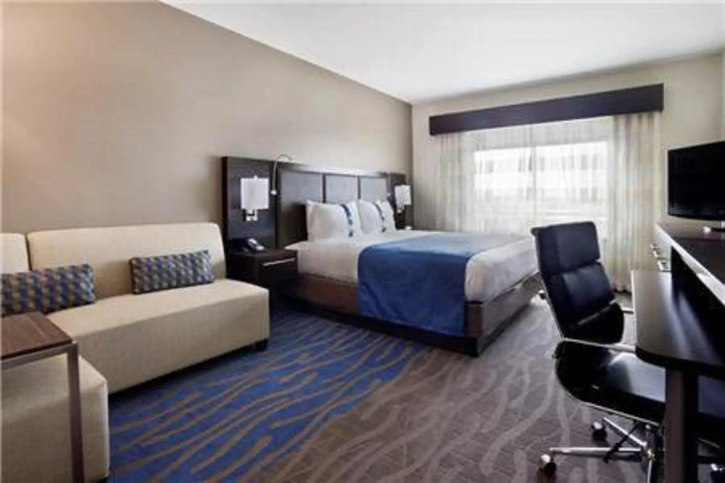 Bedroom in Holiday Inn Hotel & Suites Northwest San Antonio, an IHG Hotel