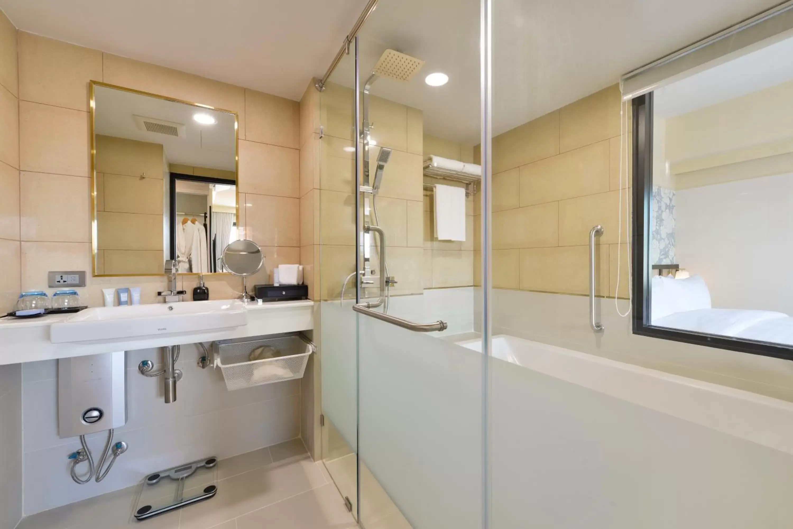 Bathroom in Oakwood Hotel & Residence Bangkok SHA Plus Certified