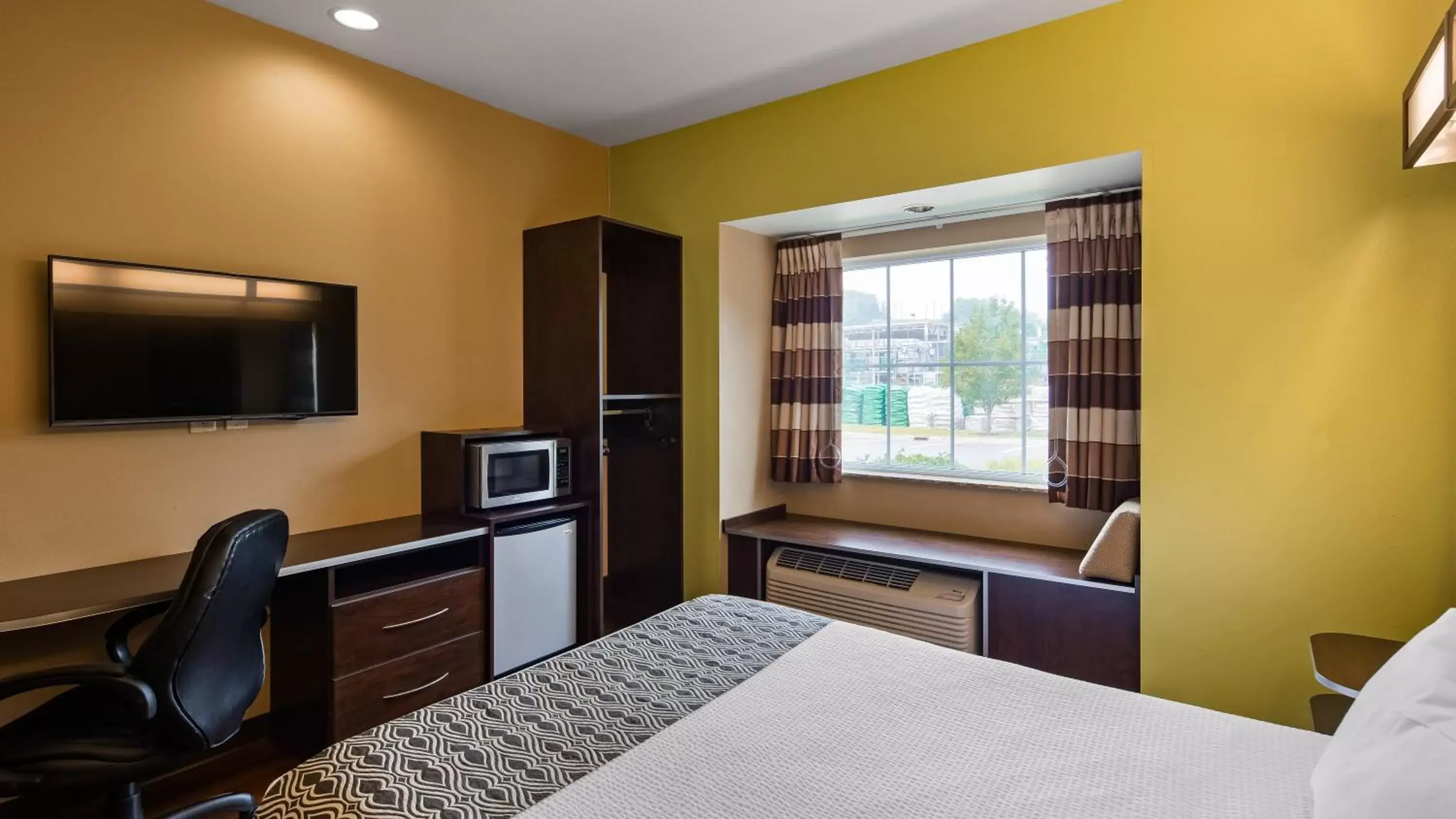 Bed in SureStay Plus Hotel by Best Western Buckhannon