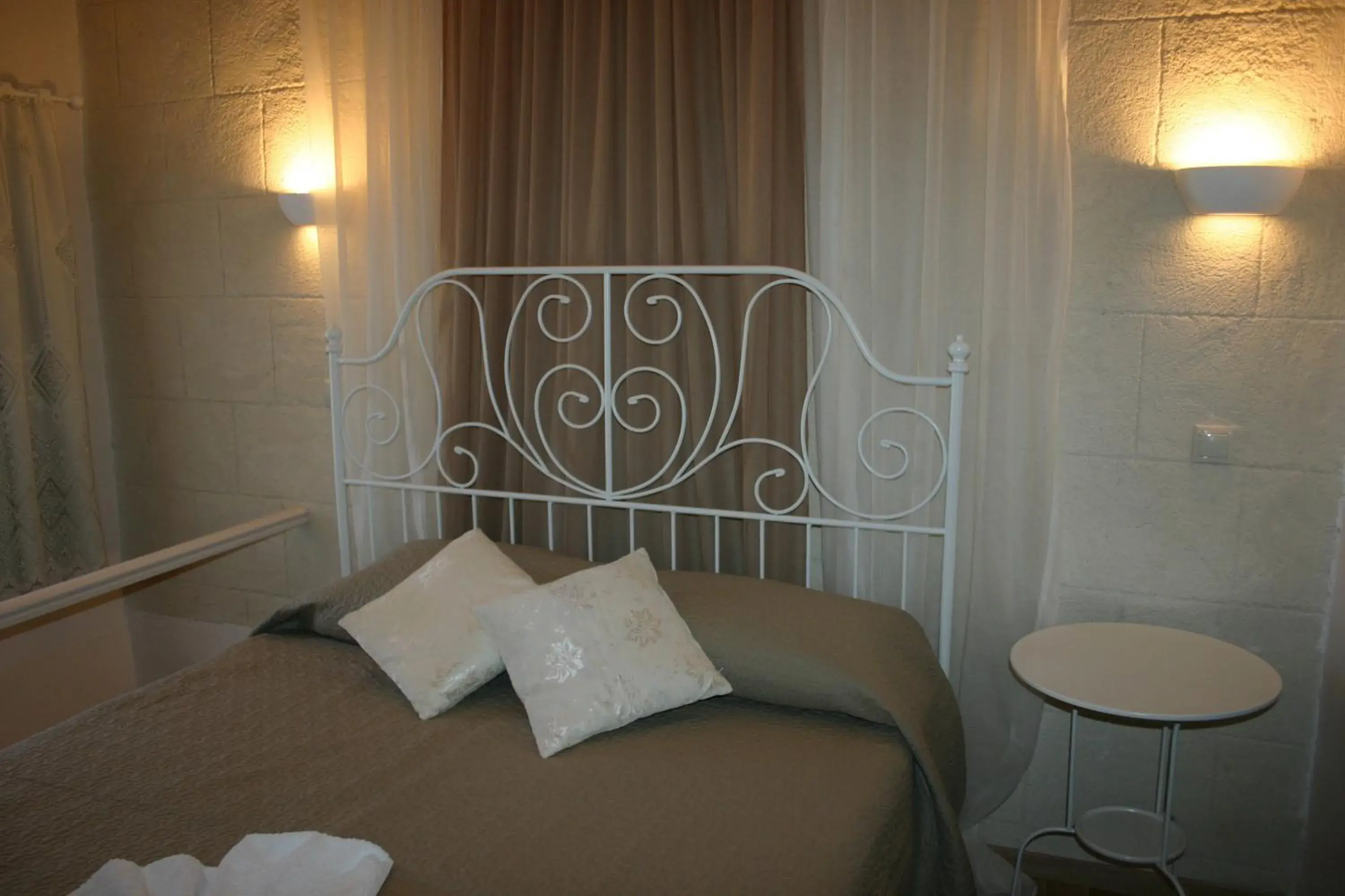 Bed in Evdokia Hotel