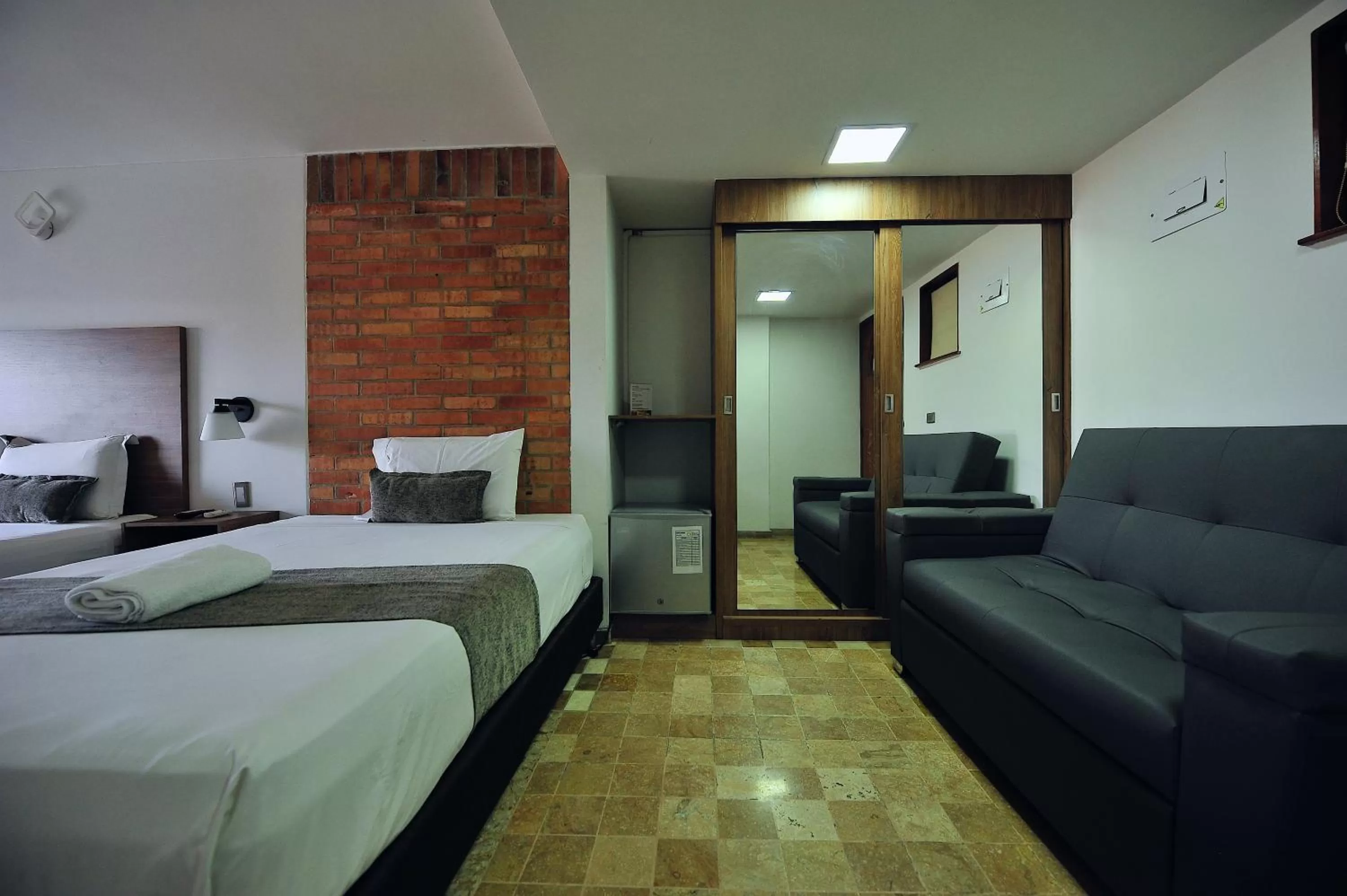 Photo of the whole room, Bed in Hotel Cabo de la Vela Medellin