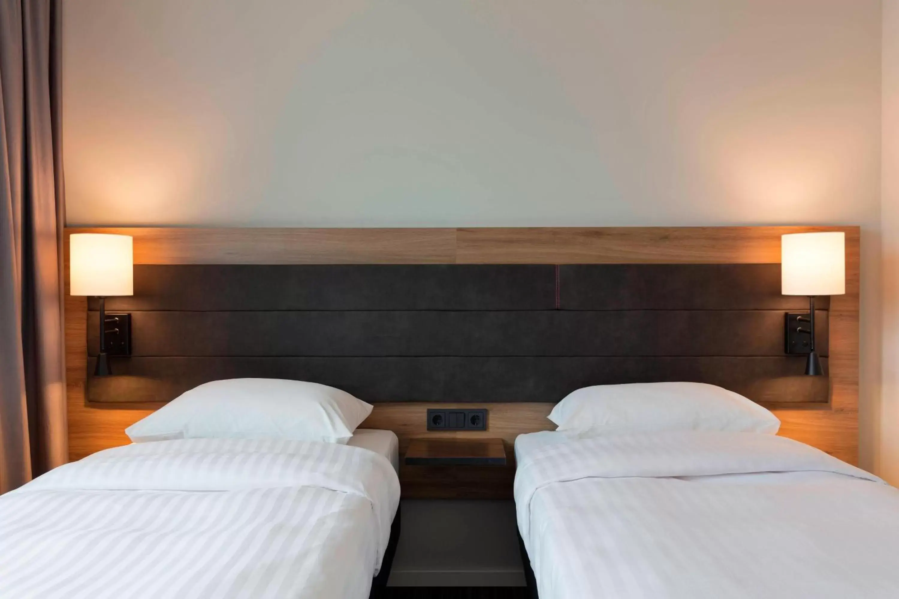 Photo of the whole room, Bed in Moxy by Marriott Stuttgart Airport/Messe