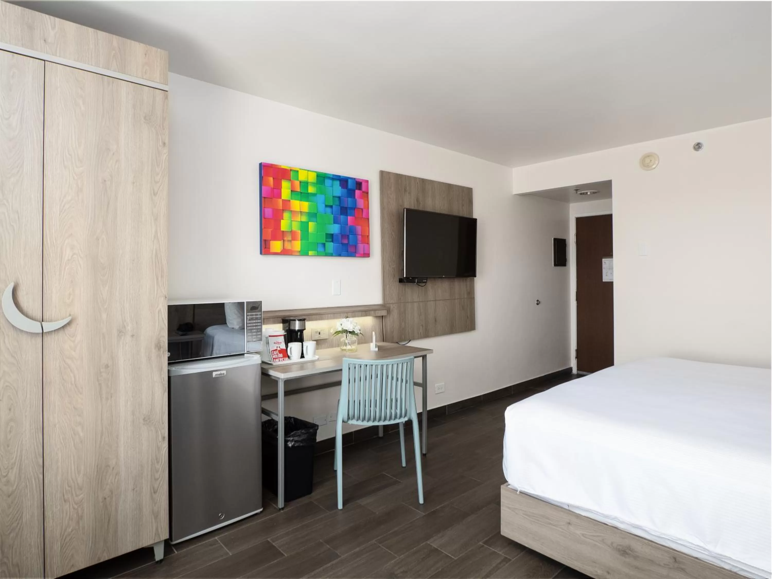 TV/Entertainment Center in Hotel Mesaluna Near American Consulate