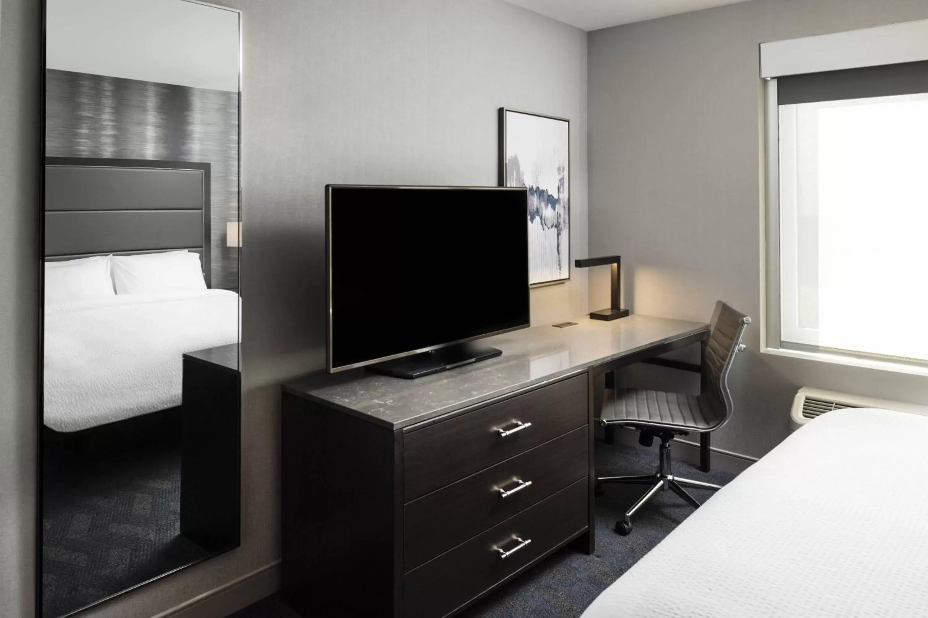 Photo of the whole room, TV/Entertainment Center in Fairfield Inn & Suites by Marriott Boston Logan Airport/Chelsea