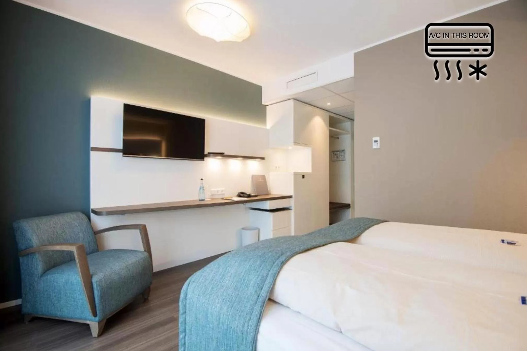 Photo of the whole room, Bed in Stadthotel Freiburg Kolping Hotels & Resorts