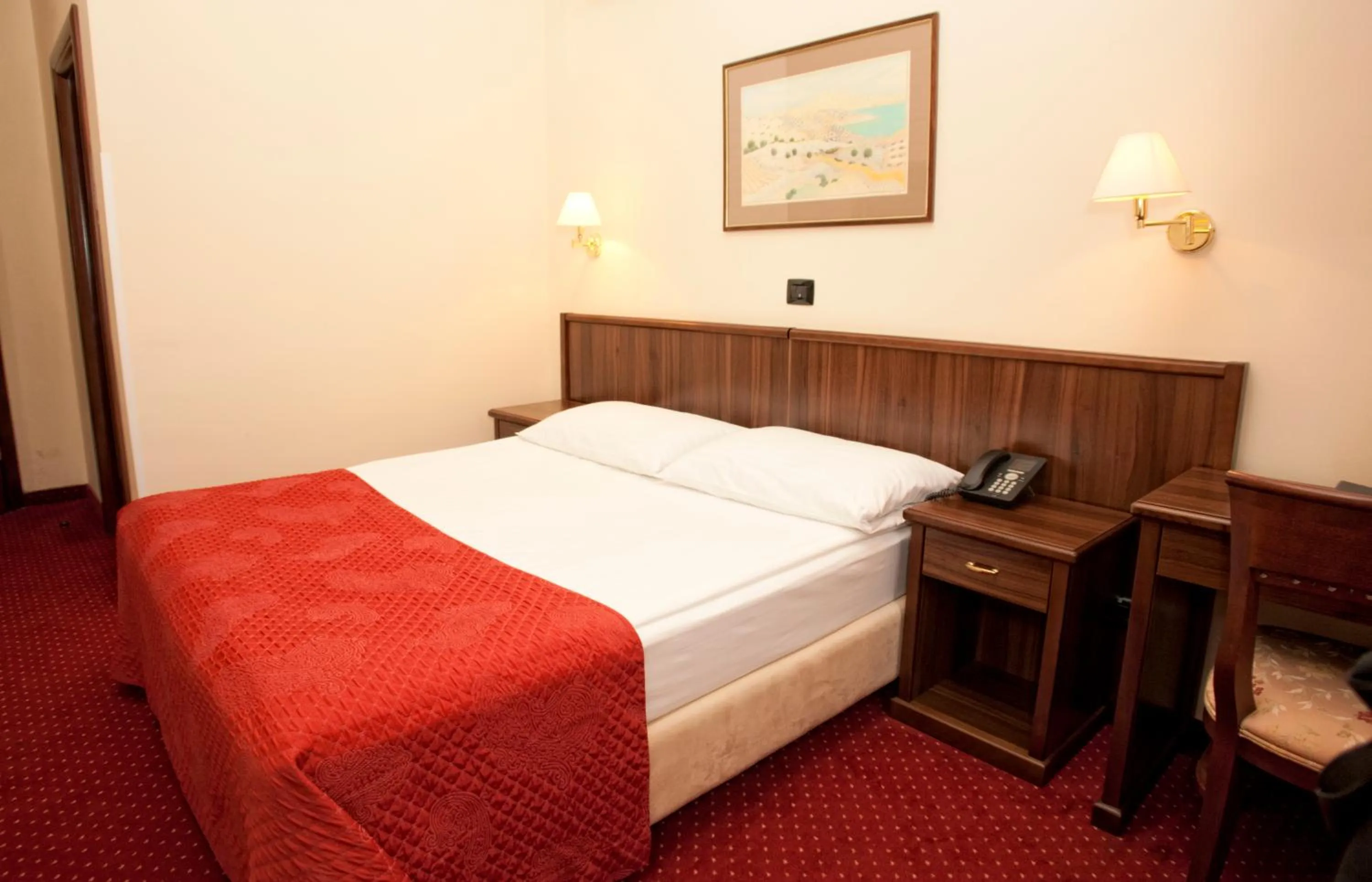 Bed in Hotel Continental