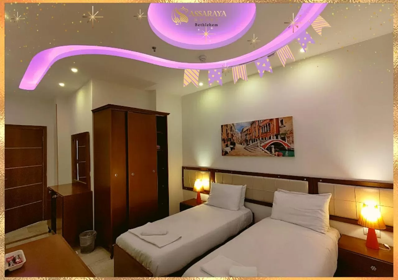 Bed in Assaraya Palace Hotel