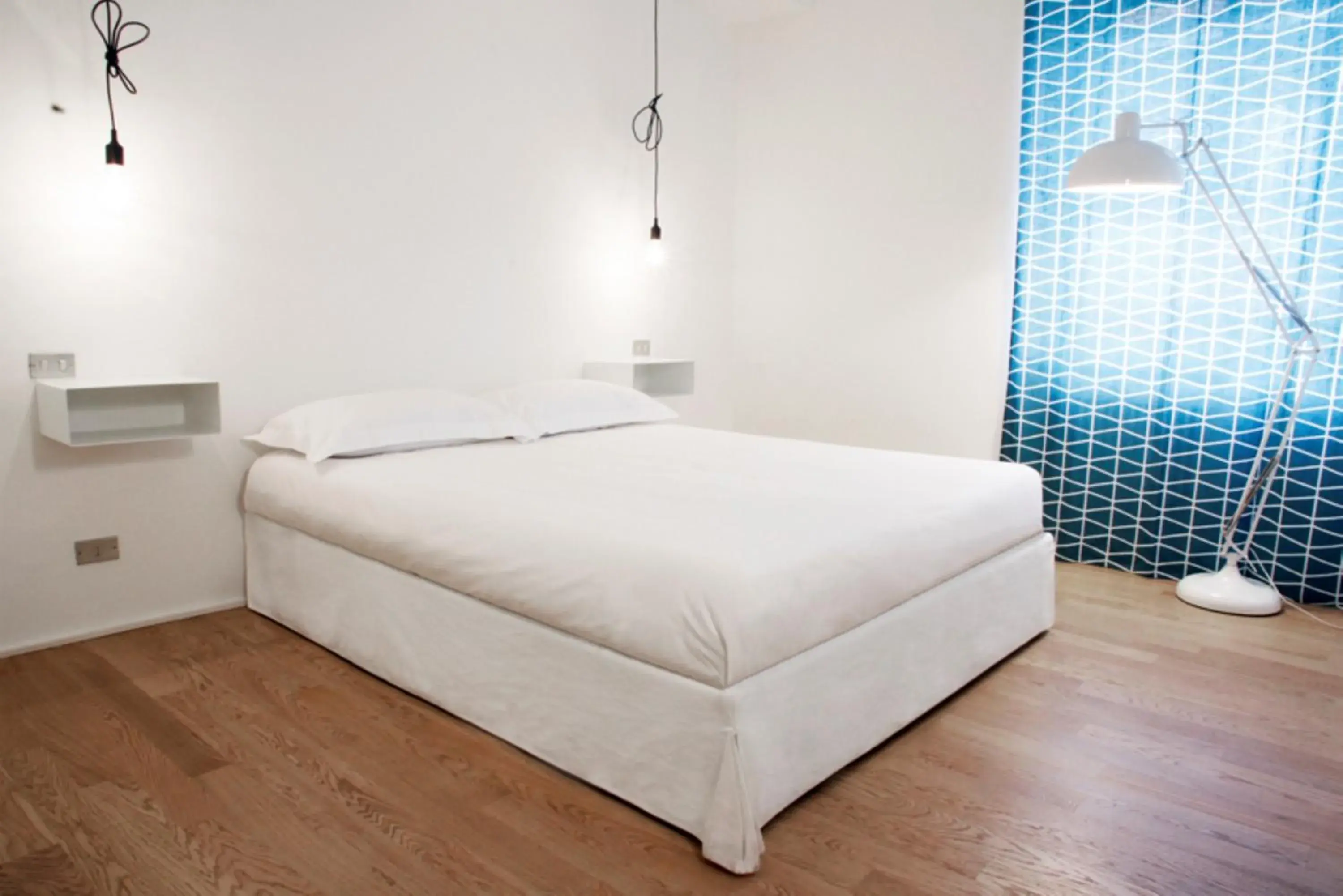 Bed in Brera Apartments in San Fermo