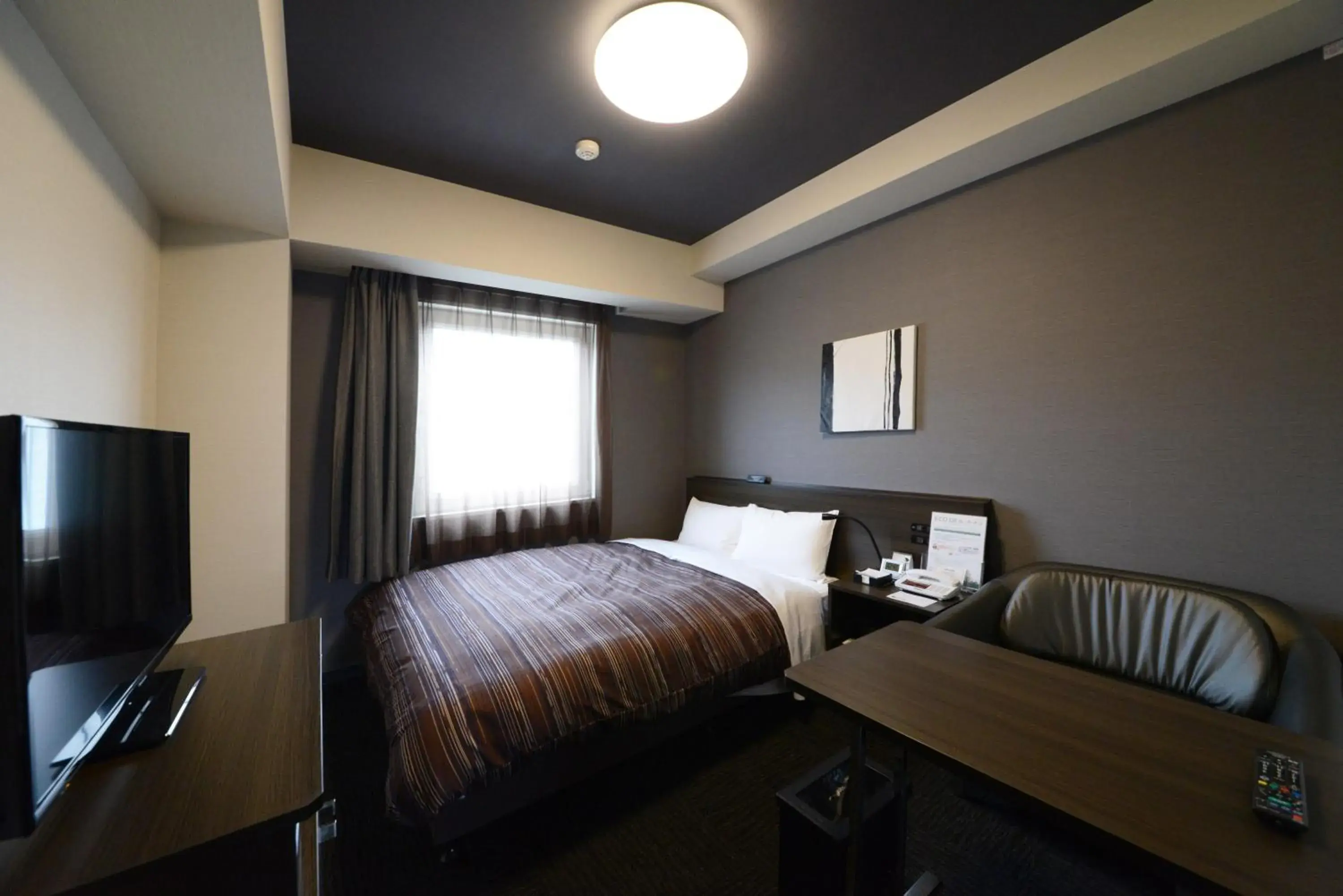 Bed in Hotel Route Inn Grand Ueda Ekimae