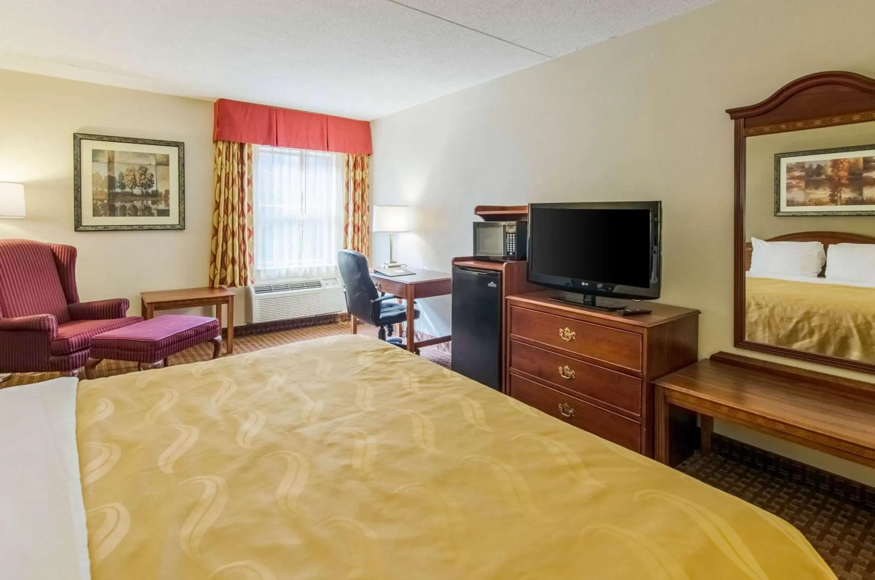 Photo of the whole room, TV/Entertainment Center in Quality Inn & Suites Lexington near I-64 and I-81