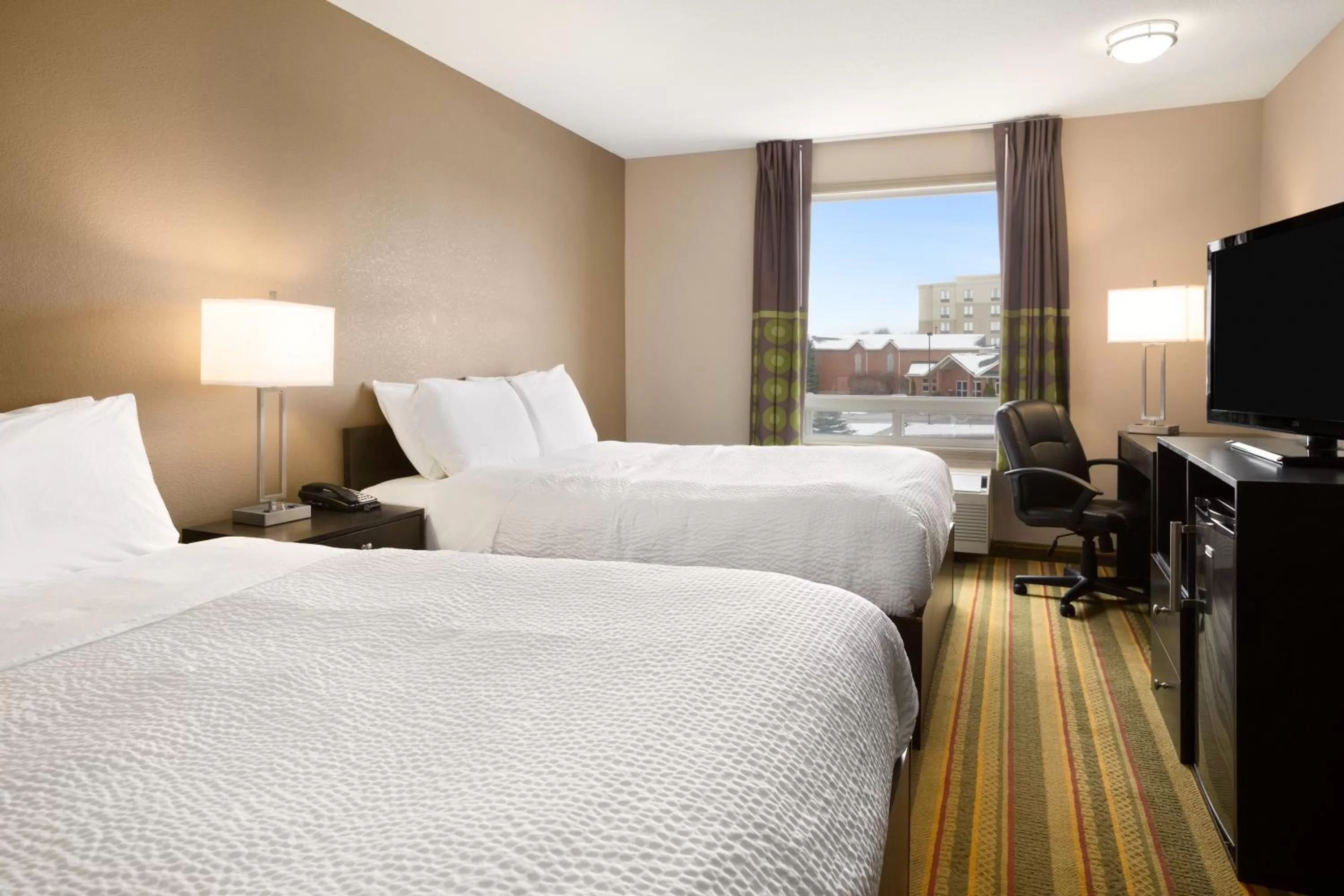 Photo of the whole room, Bed in Days Inn by Wyndham Woodstock