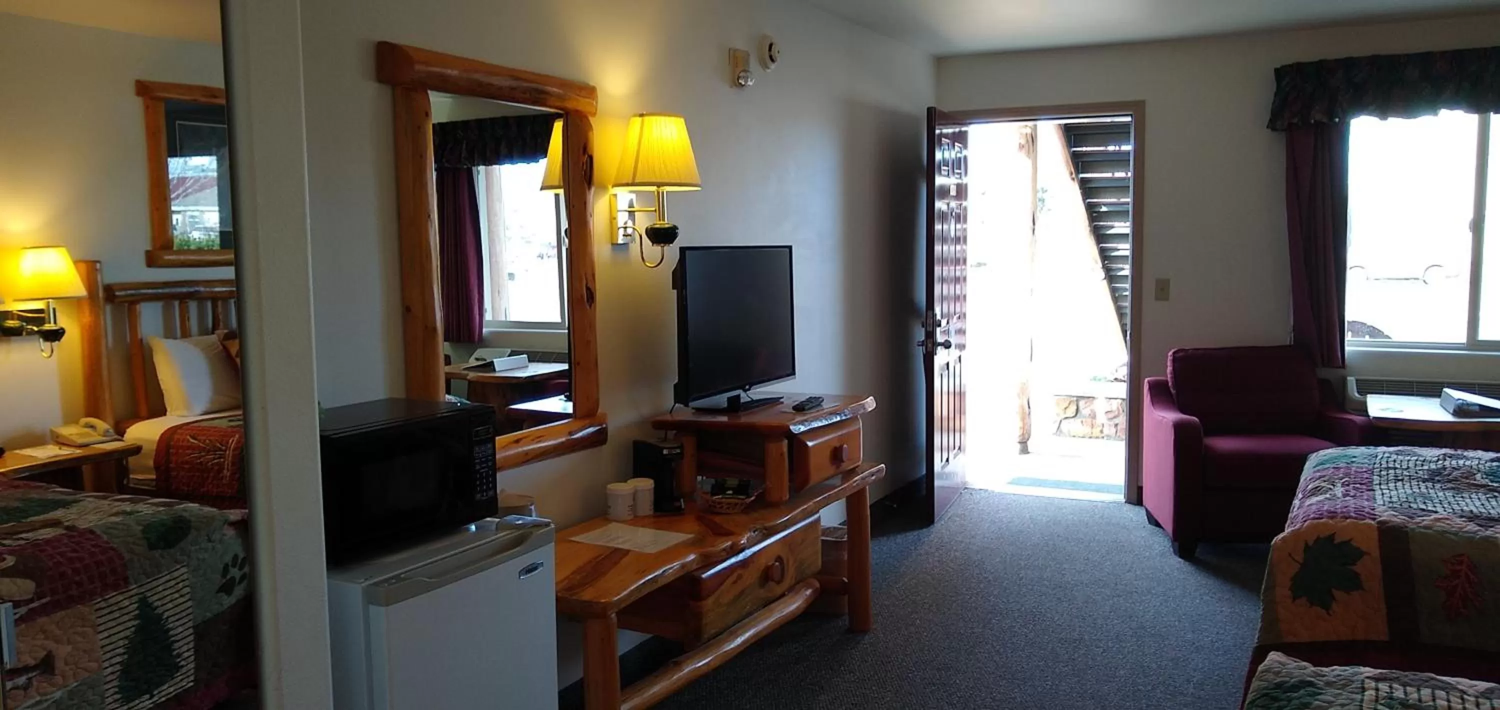 Bed in Ponderosa Motel