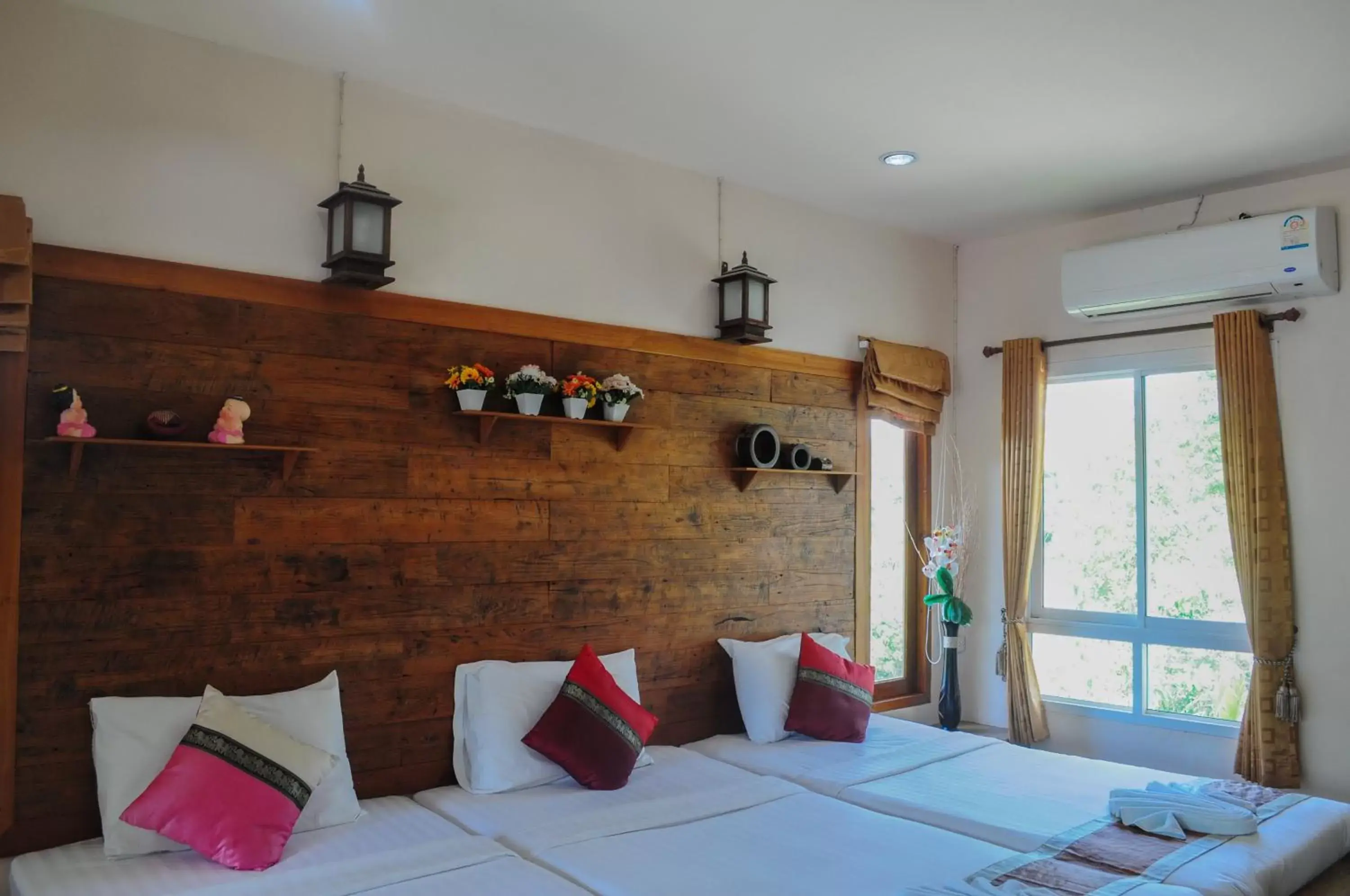 Bed in Pai Iyara Resort