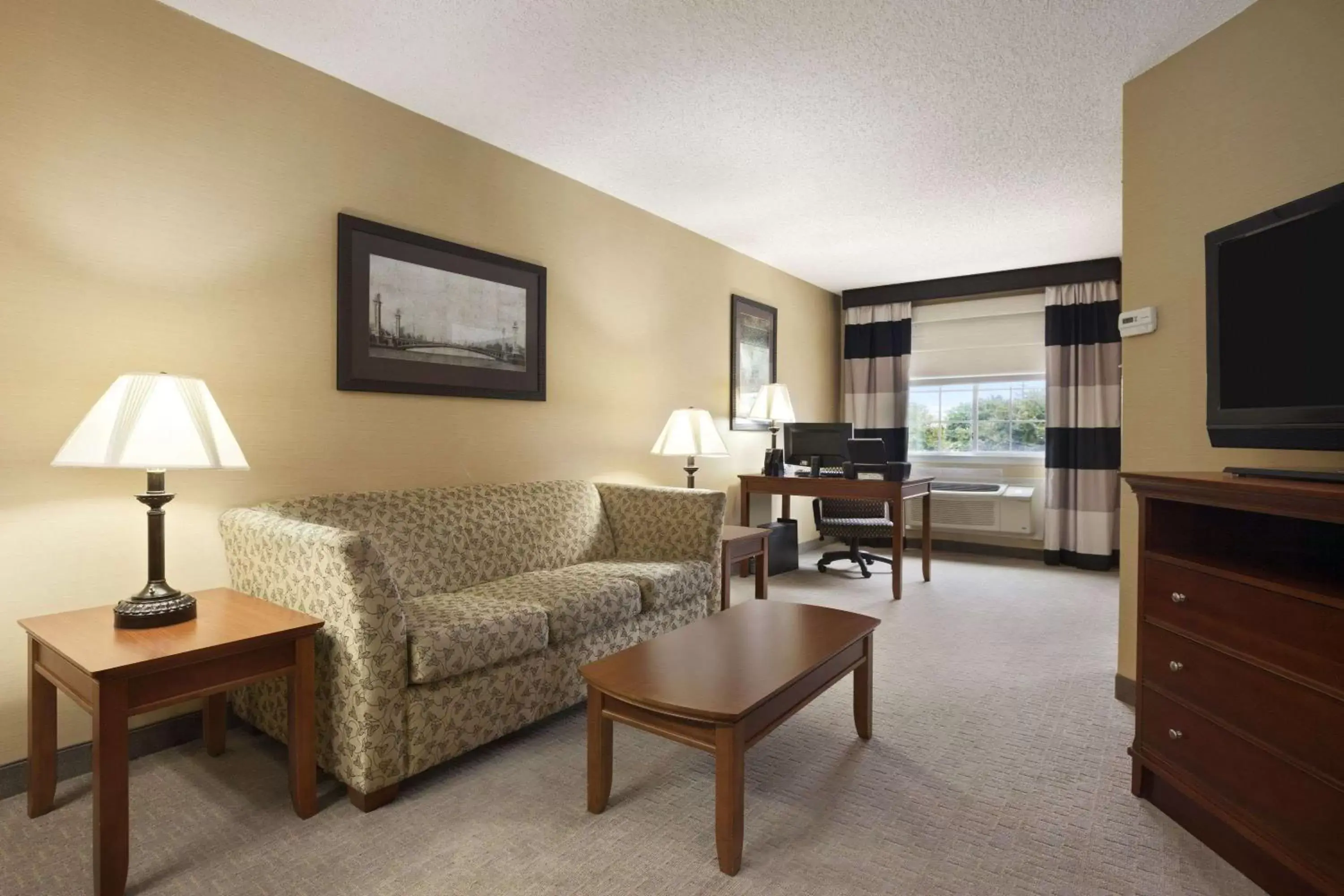 Photo of the whole room, Seating Area in Ramada by Wyndham Del Rio