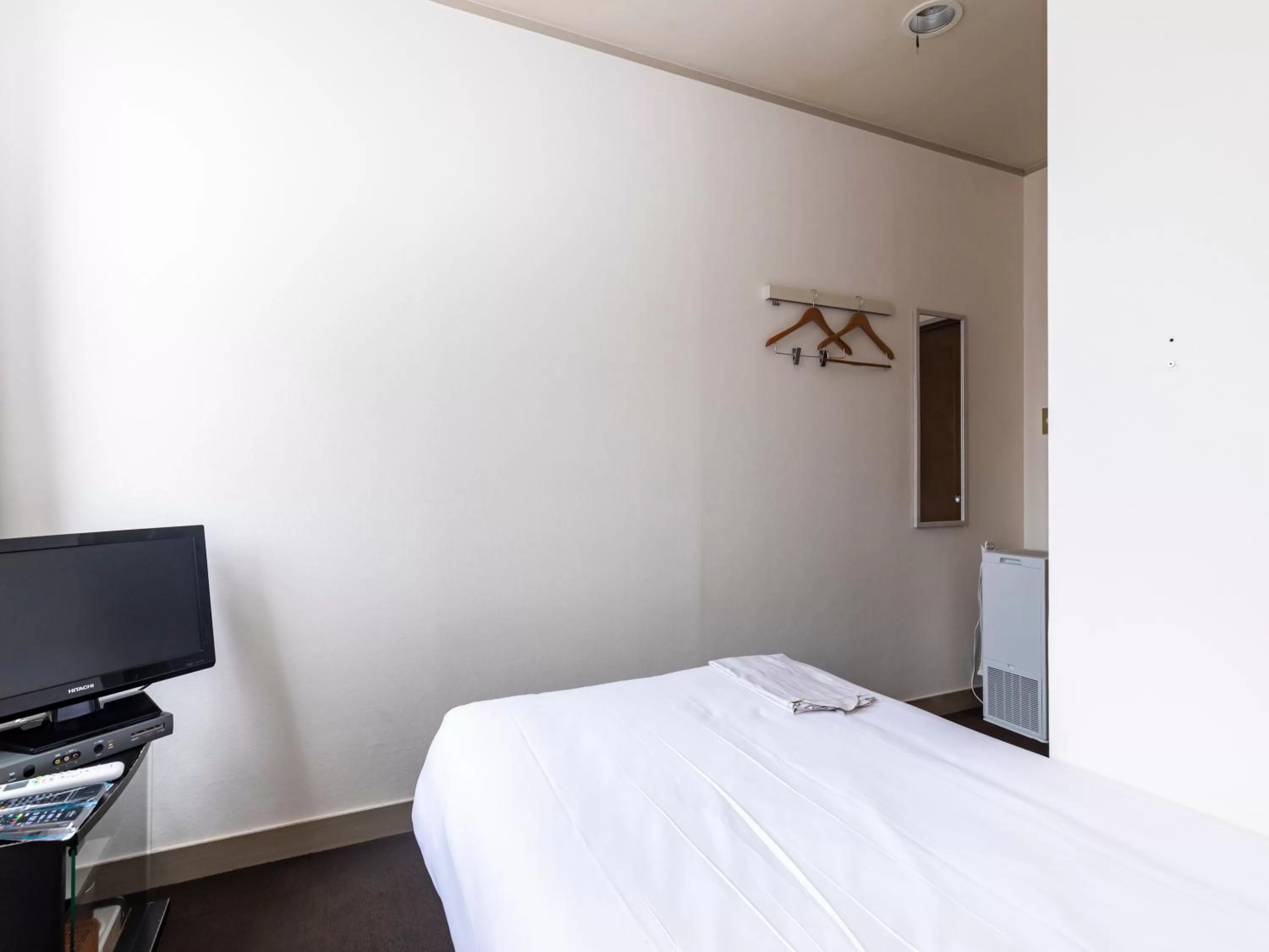Photo of the whole room, Bed in Tabist Business Hotel Suehiro Matsuyama