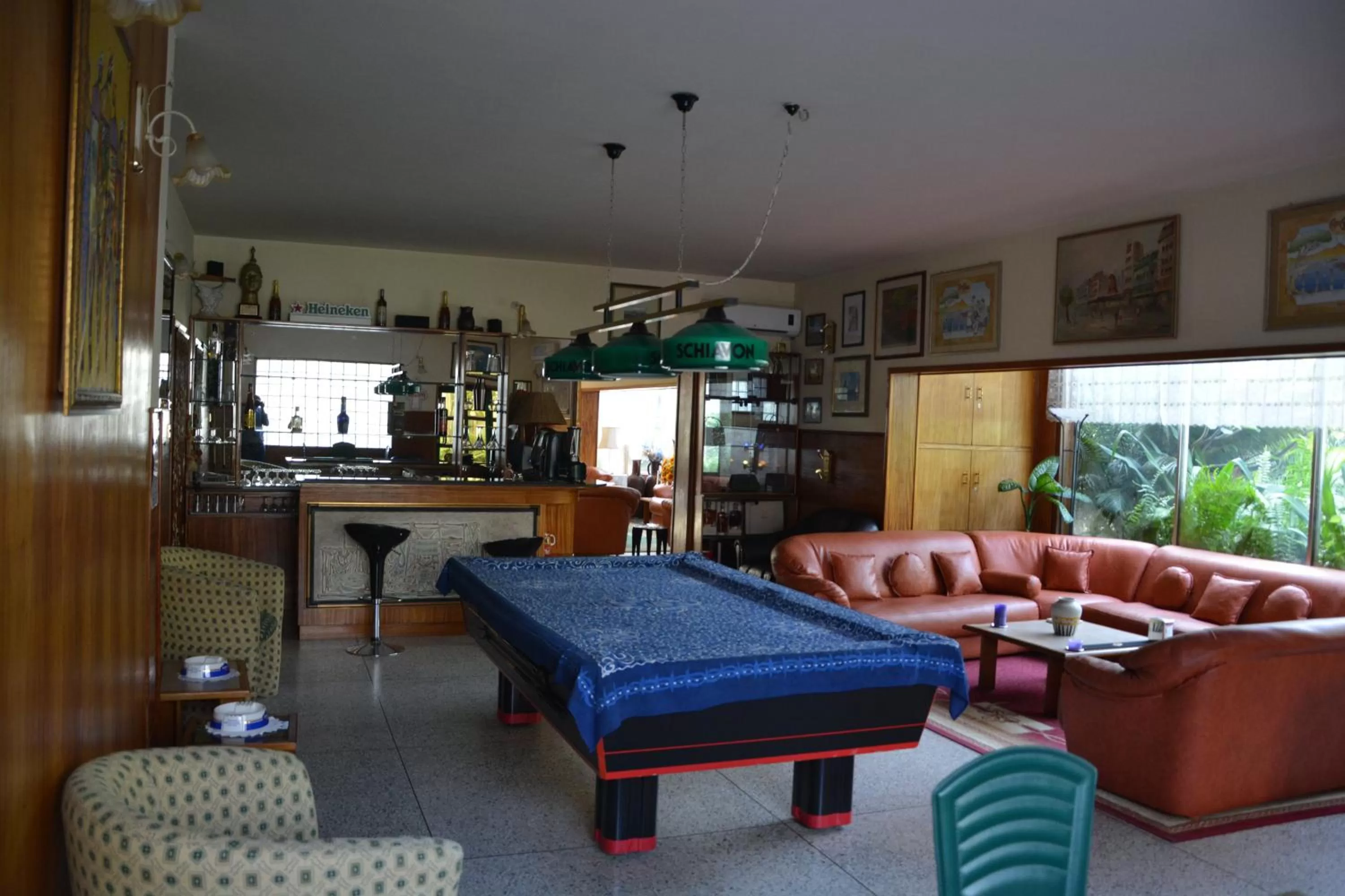 Communal lounge/ TV room in Manuela Residence