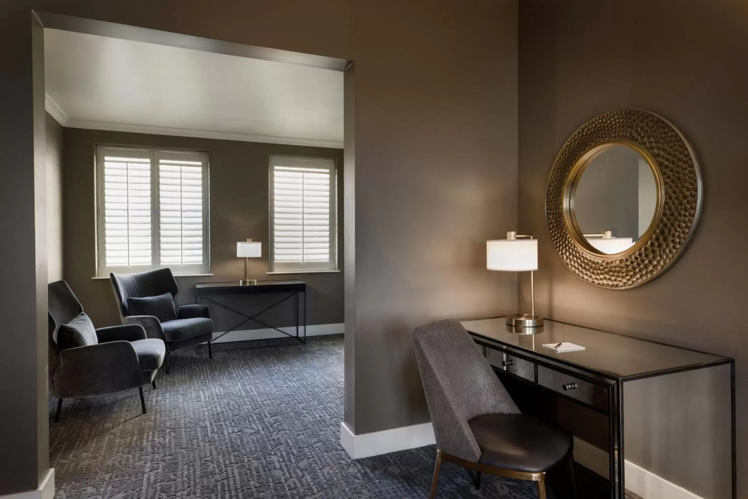 Bedroom, Seating Area in Ambassador Hotel Oklahoma City, Autograph Collection