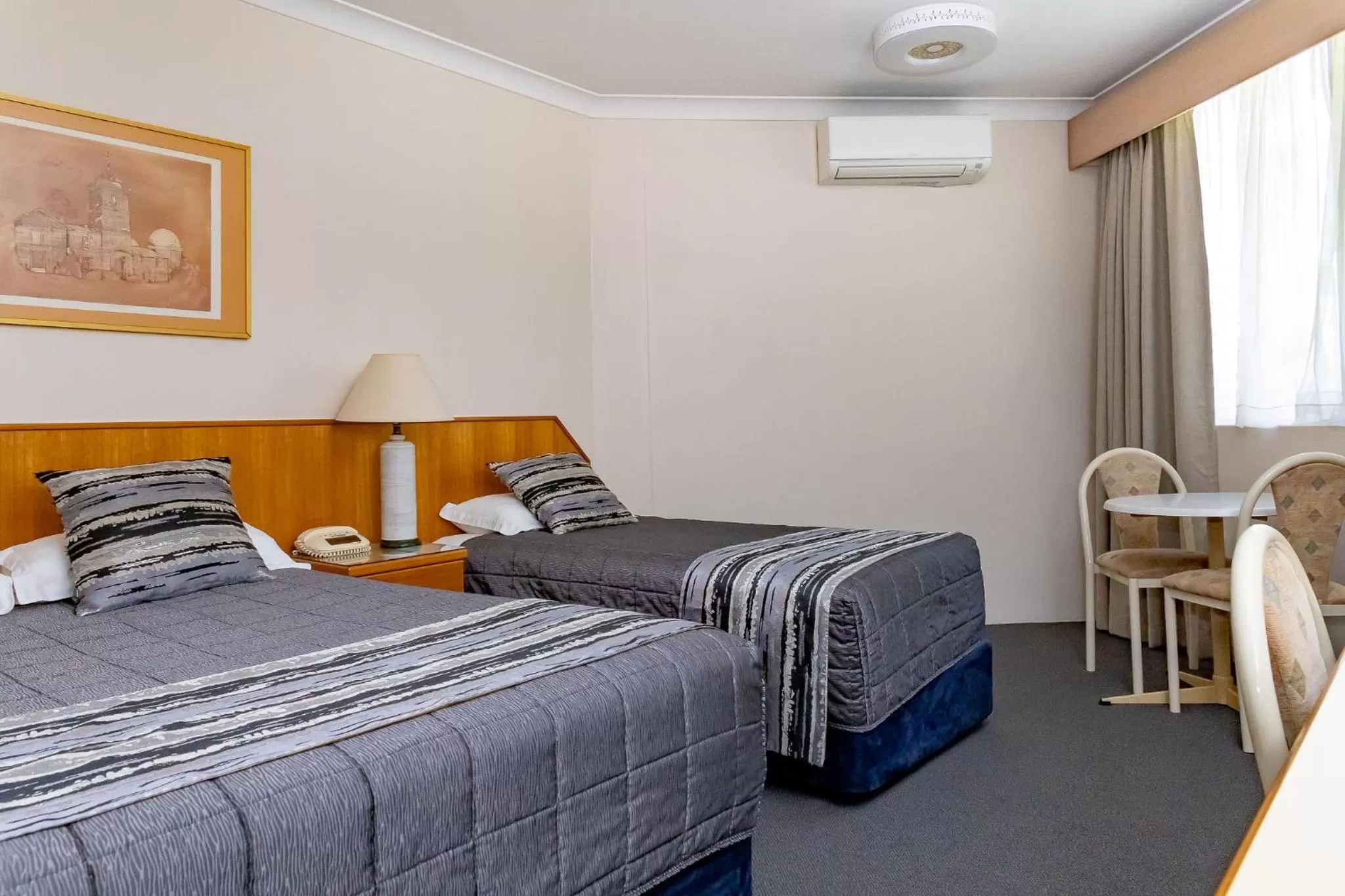 Bed in Charbonnier Motor Inn