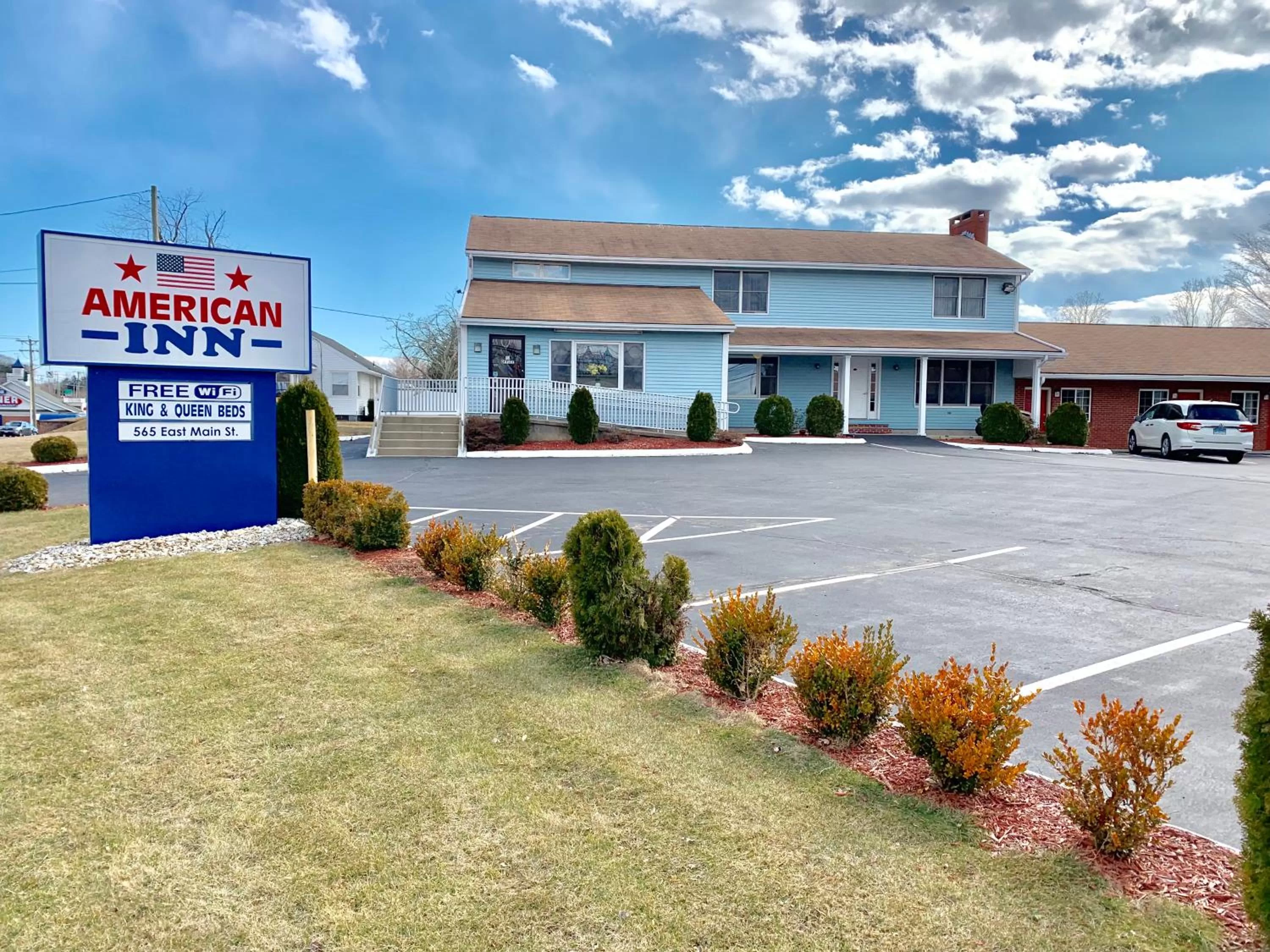 Property logo or sign in American Inn