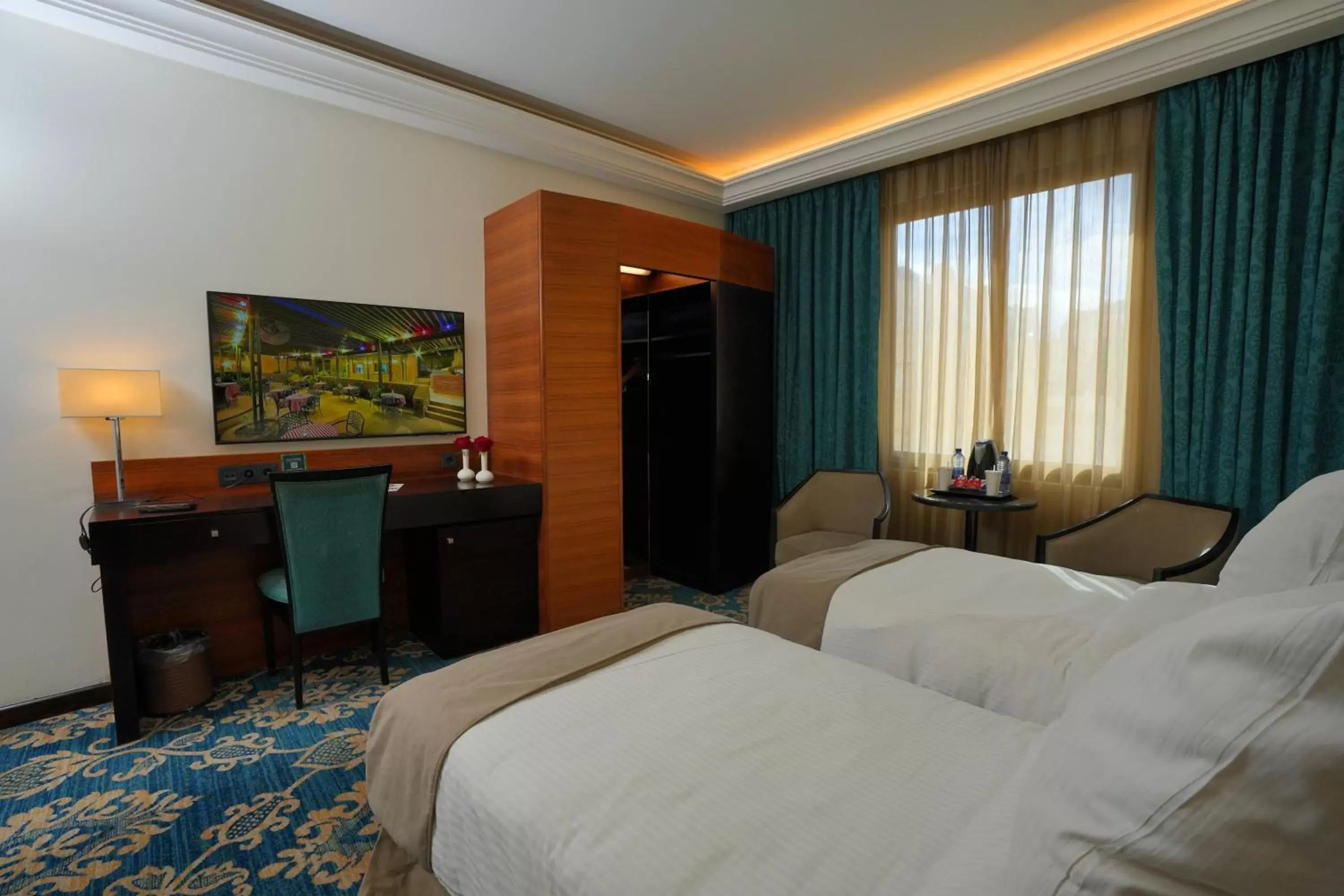 TV and multimedia, Bed in Corp Amman Hotel