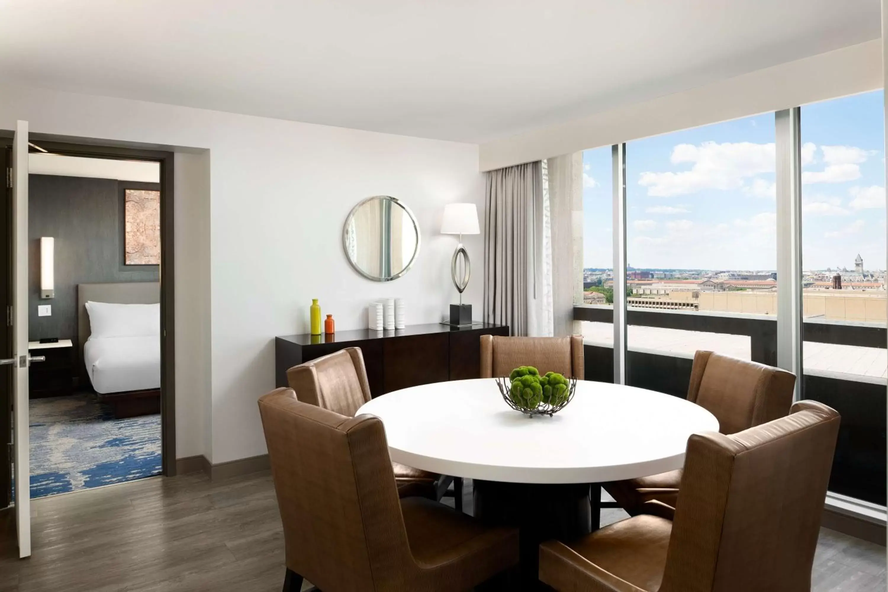 Living room, Dining Area in Hilton Washington DC National Mall The Wharf