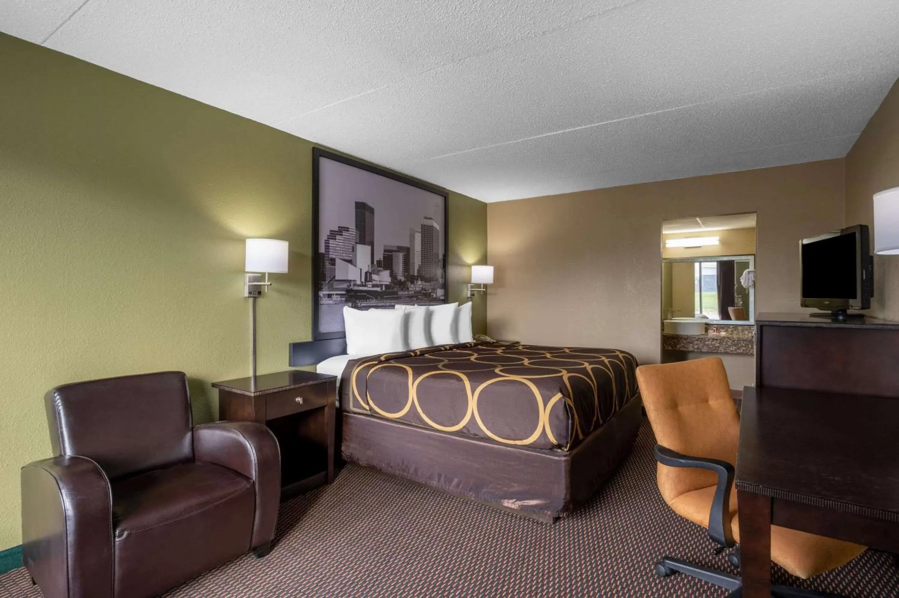 Photo of the whole room, Seating Area in Super 8 by Wyndham Perrysburg-Toledo