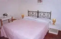 Bed in Hotel Aldobrandini