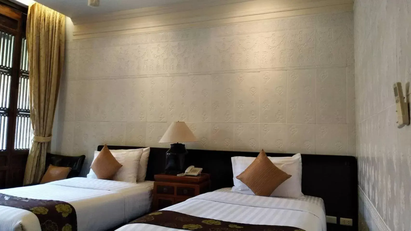 Bed in Tharaburi Resort