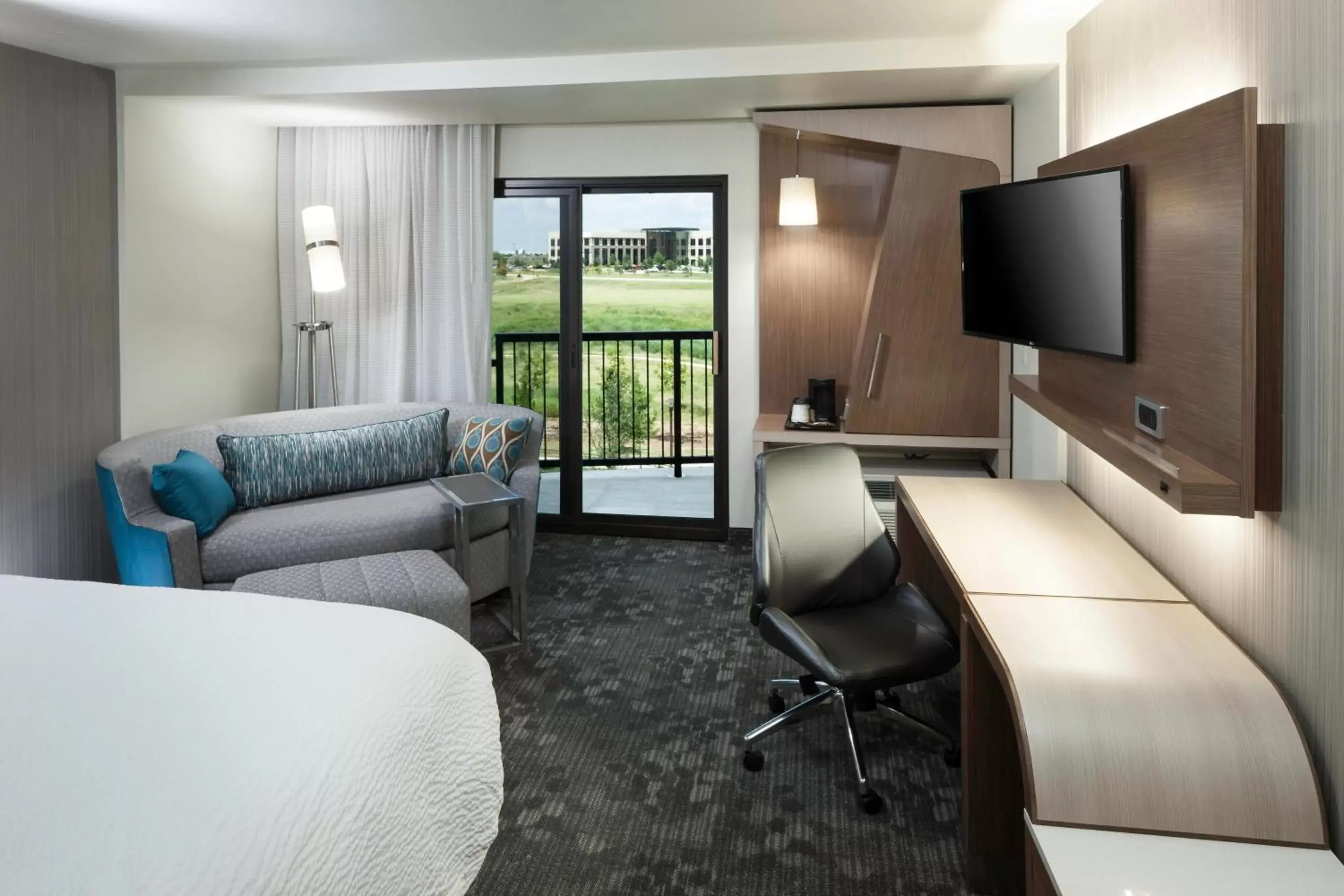 Photo of the whole room, Seating Area in Courtyard by Marriott Fort Worth Alliance Town Center