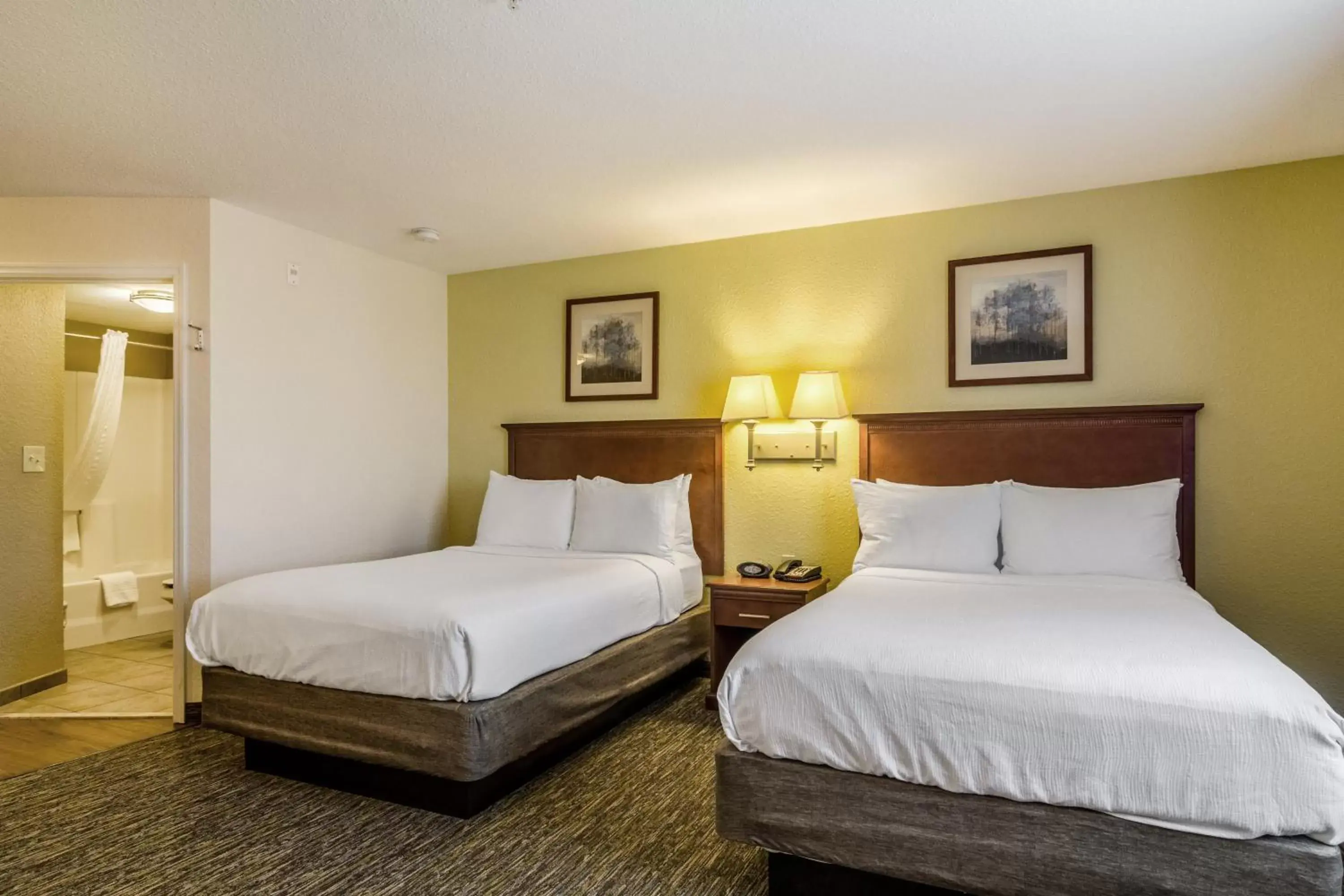 Photo of the whole room, Bed in Candlewood Suites Jacksonville East Merril Road, an IHG Hotel