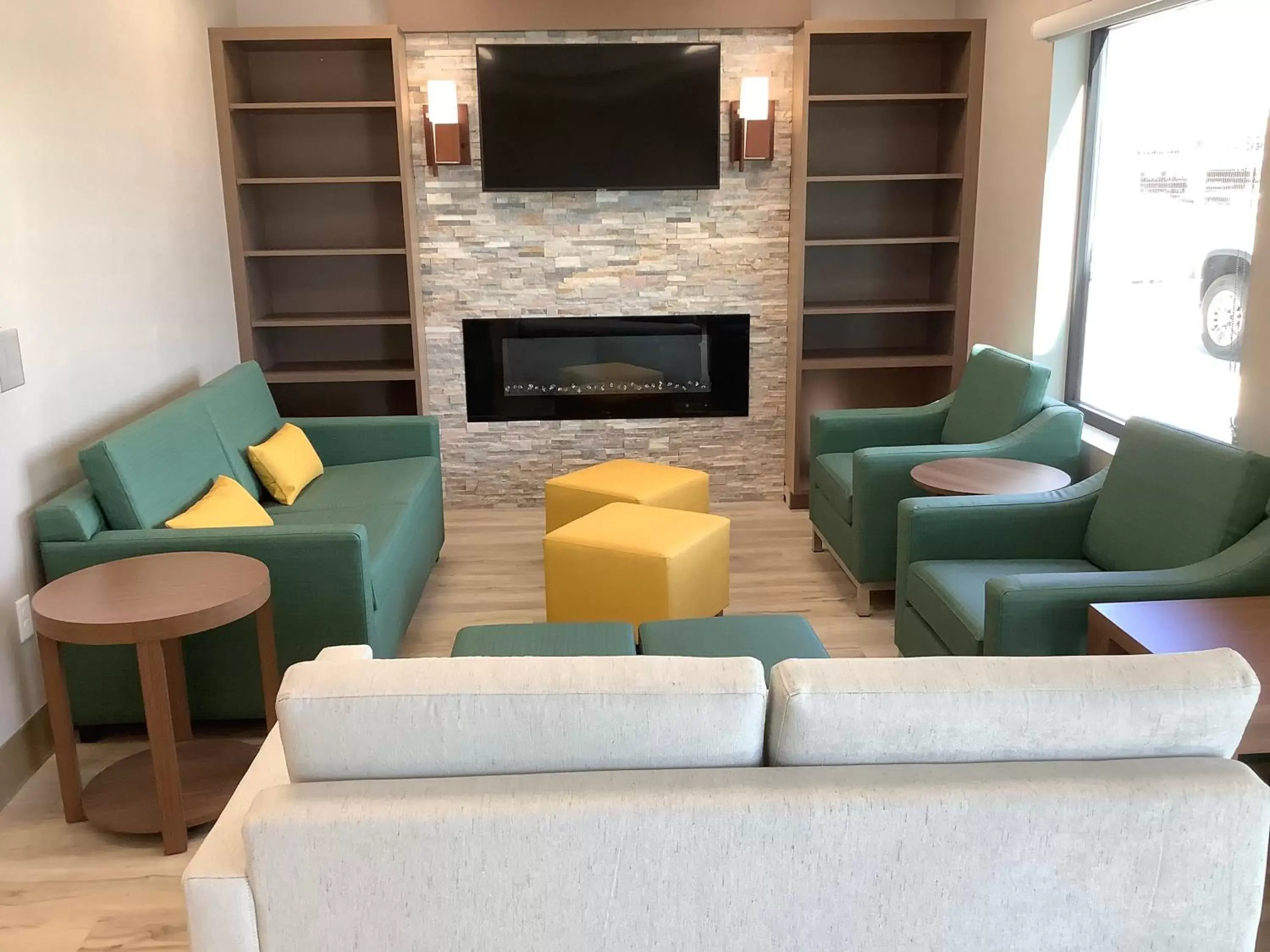 Communal lounge/ TV room, Seating Area in MainStay Suites Colorado Springs East - Medical Center Area