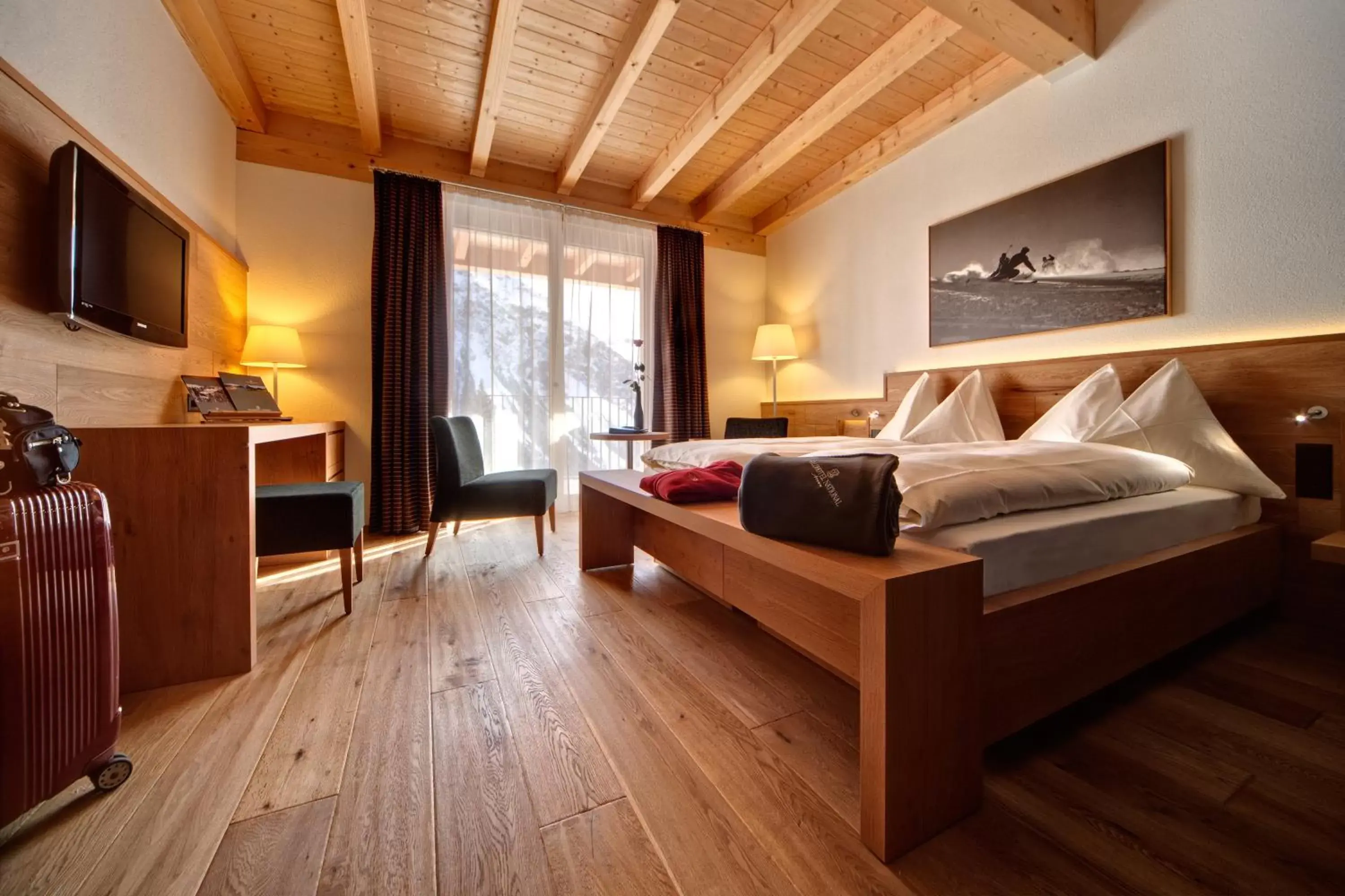 Photo of the whole room, Bed in Waldhotel Arosa