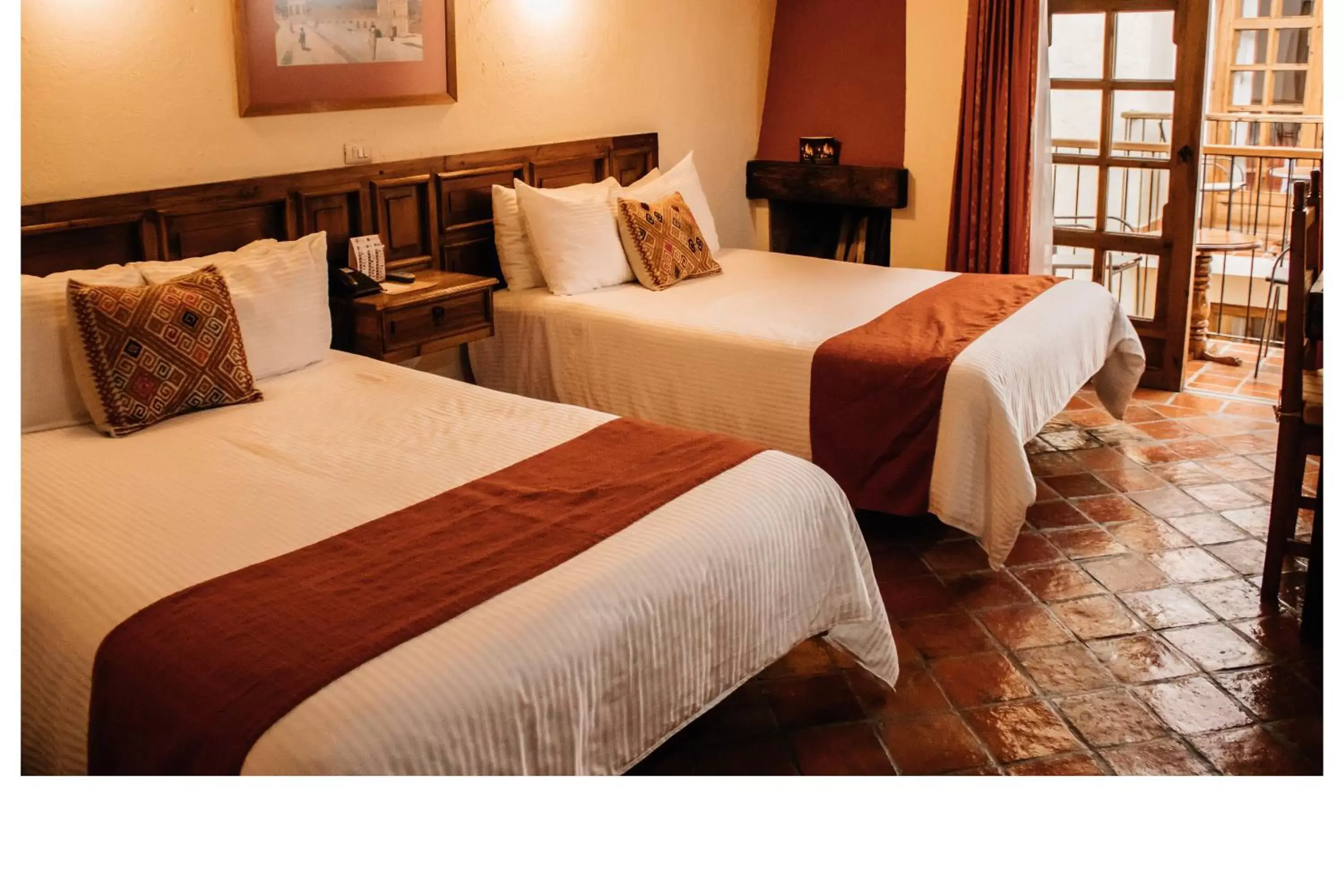 Bed in Hotel Diego de Mazariegos
