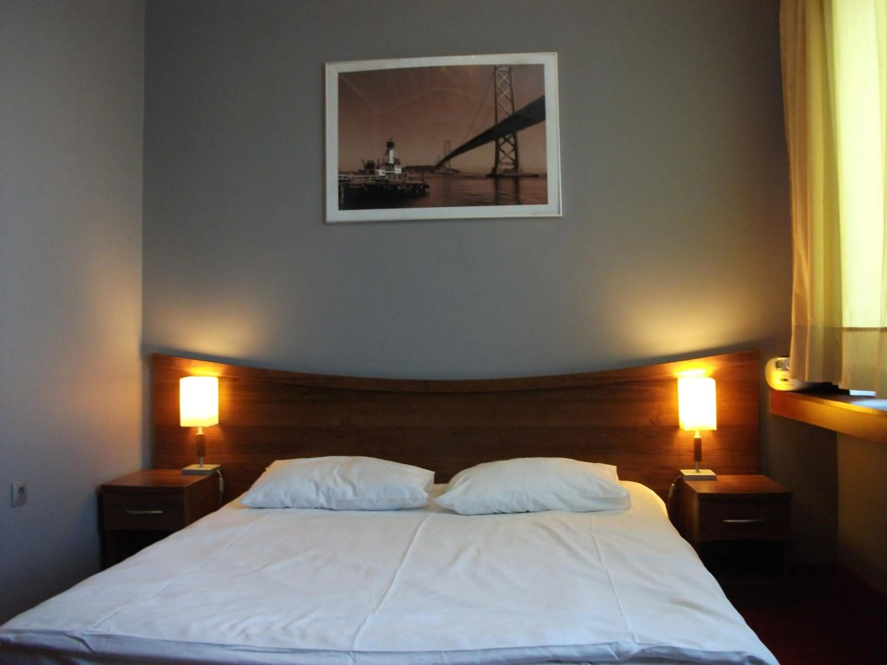 Photo of the whole room, Bed in M Hotel