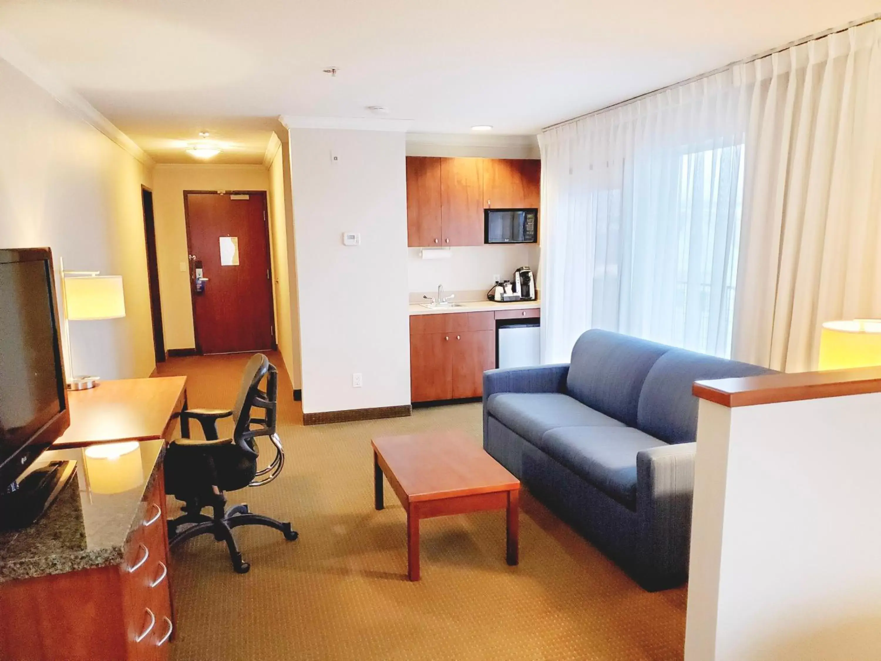 TV and multimedia, Seating Area in Holiday Inn Express Hotel & Suites Portland-Northwest Downtown, an IHG Hotel