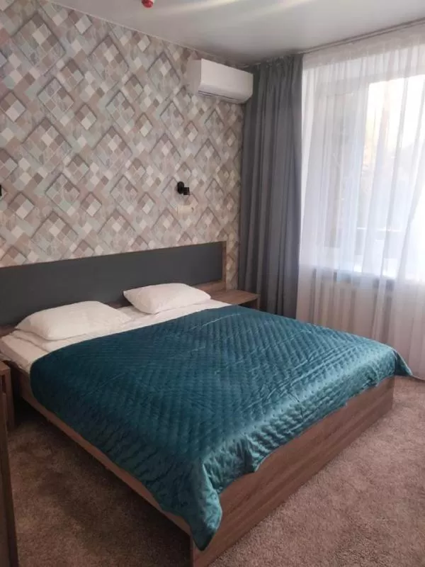 Bed in Hotel Prydesnyansky