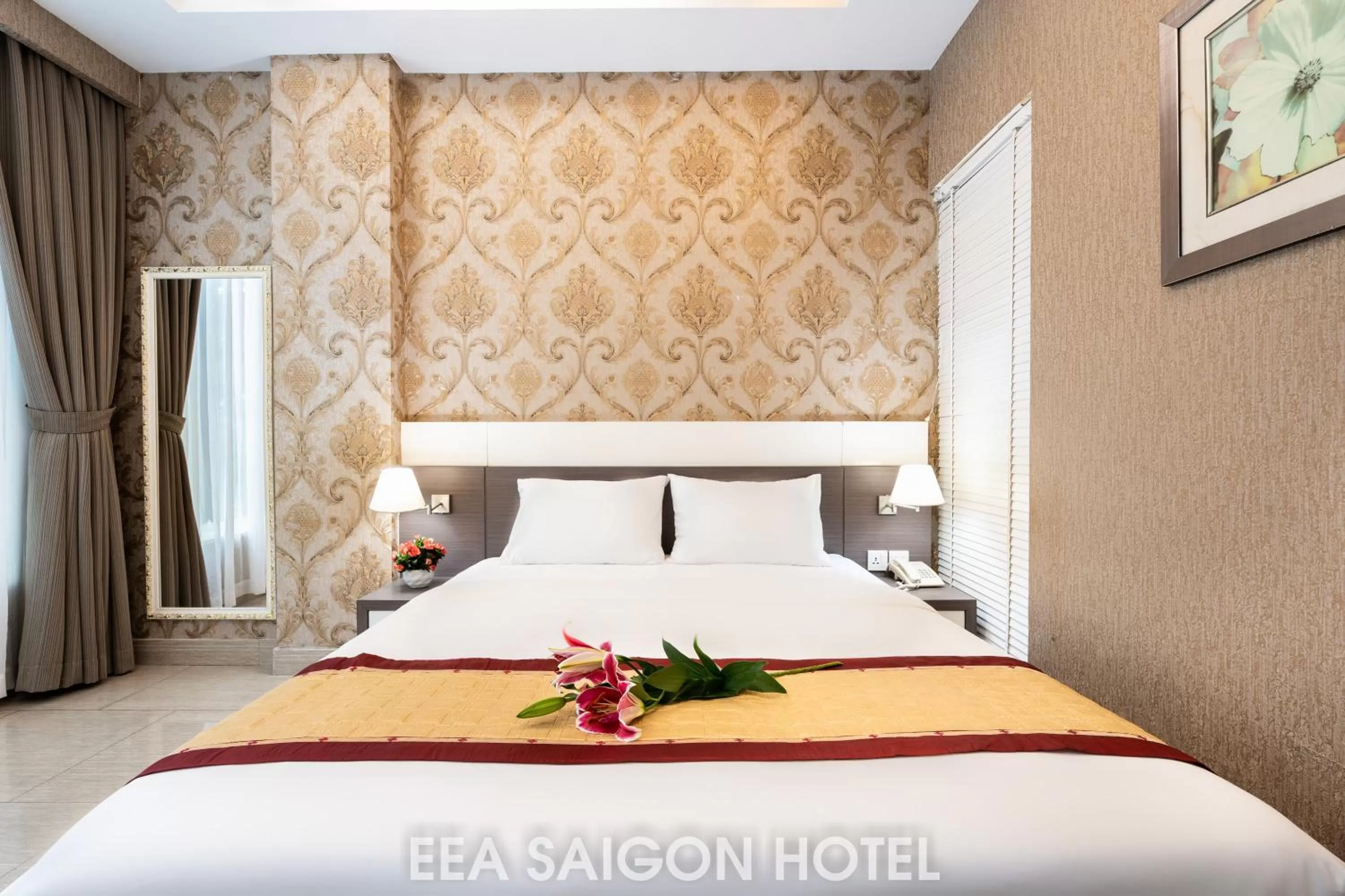 Bed in EEA Central Saigon Hotel