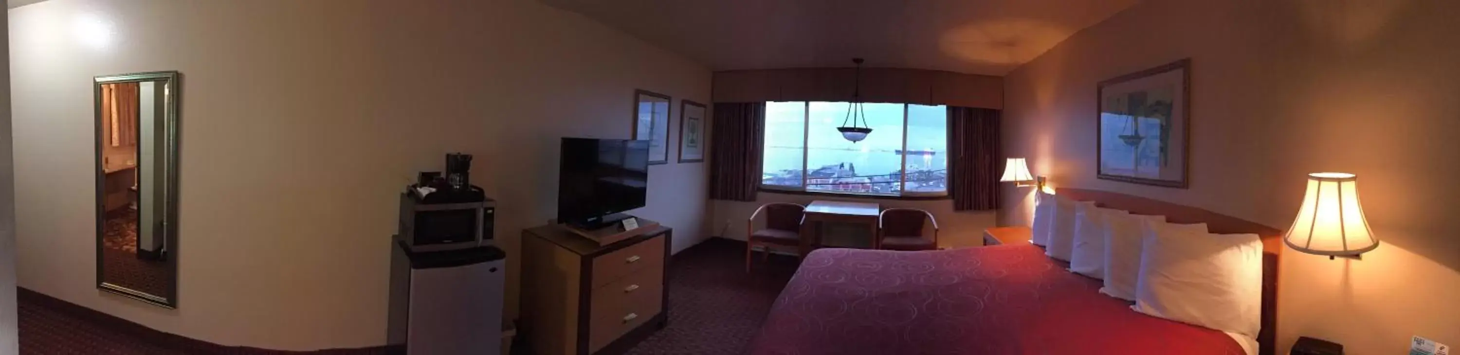 Photo of the whole room, TV/Entertainment Center in Port Angeles Inn