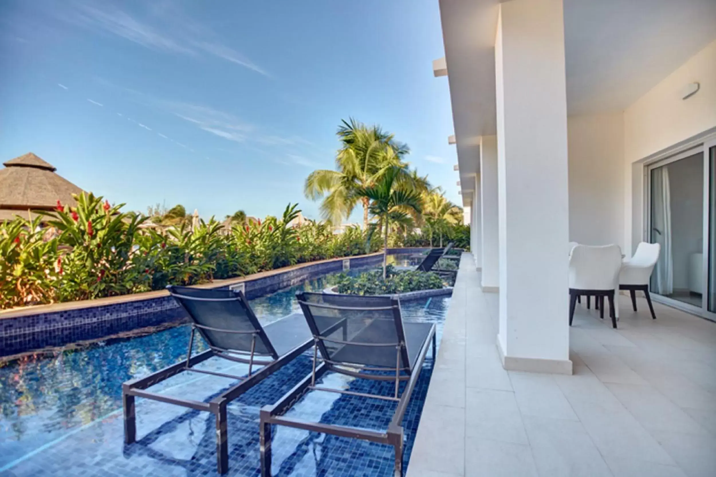 Balcony/Terrace, Swimming Pool in Hideaway at Royalton Blue Waters, An Autograph Collection all-Inclusive Resort - Adults Only