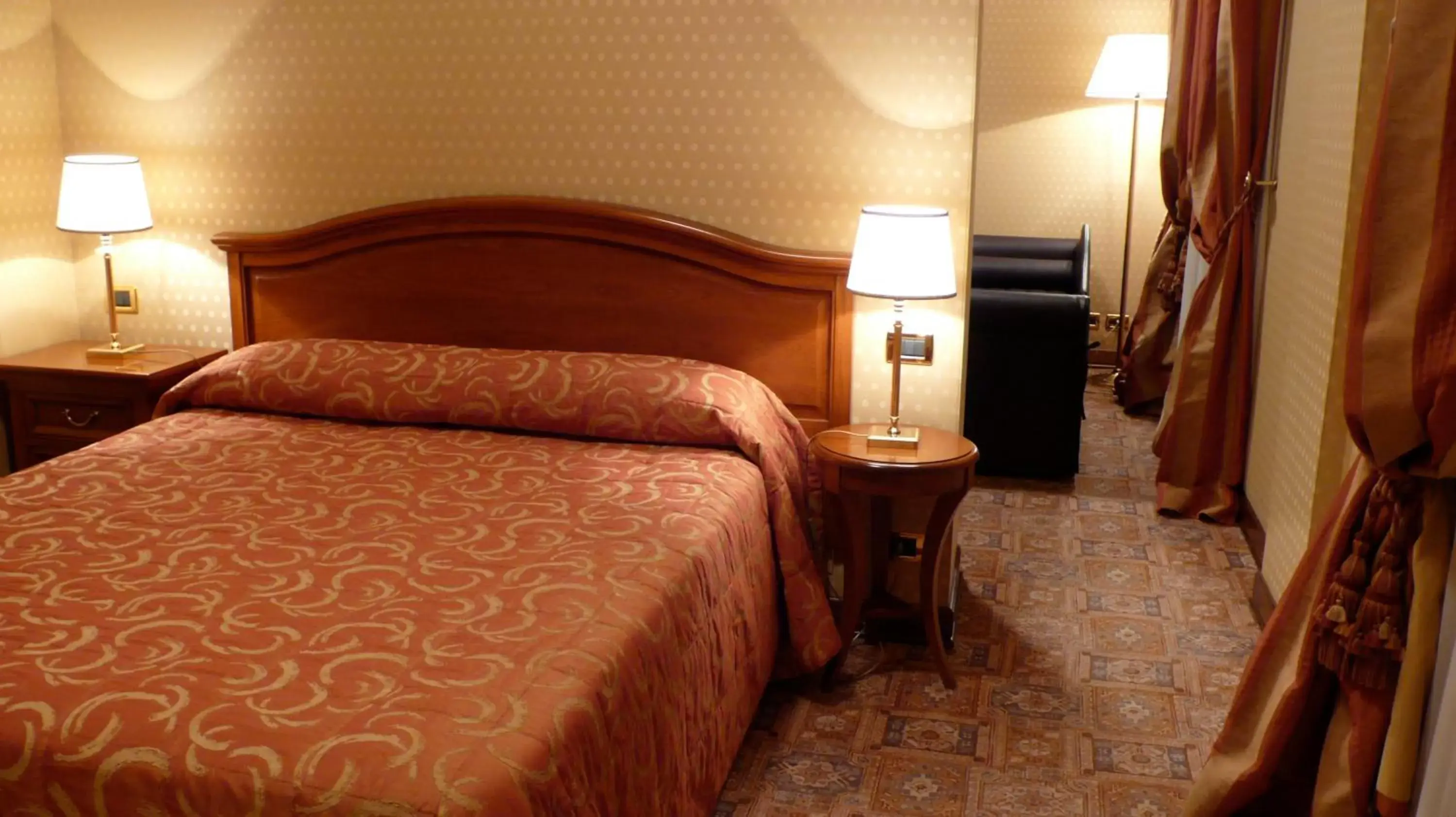Bed in Hotel Oceania
