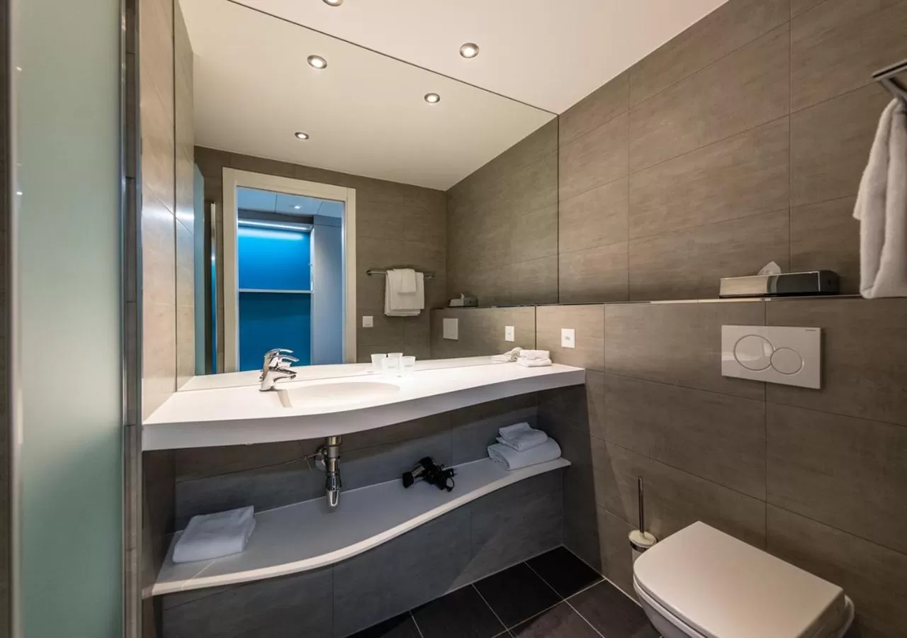 Toilet in Aquatis Hotel